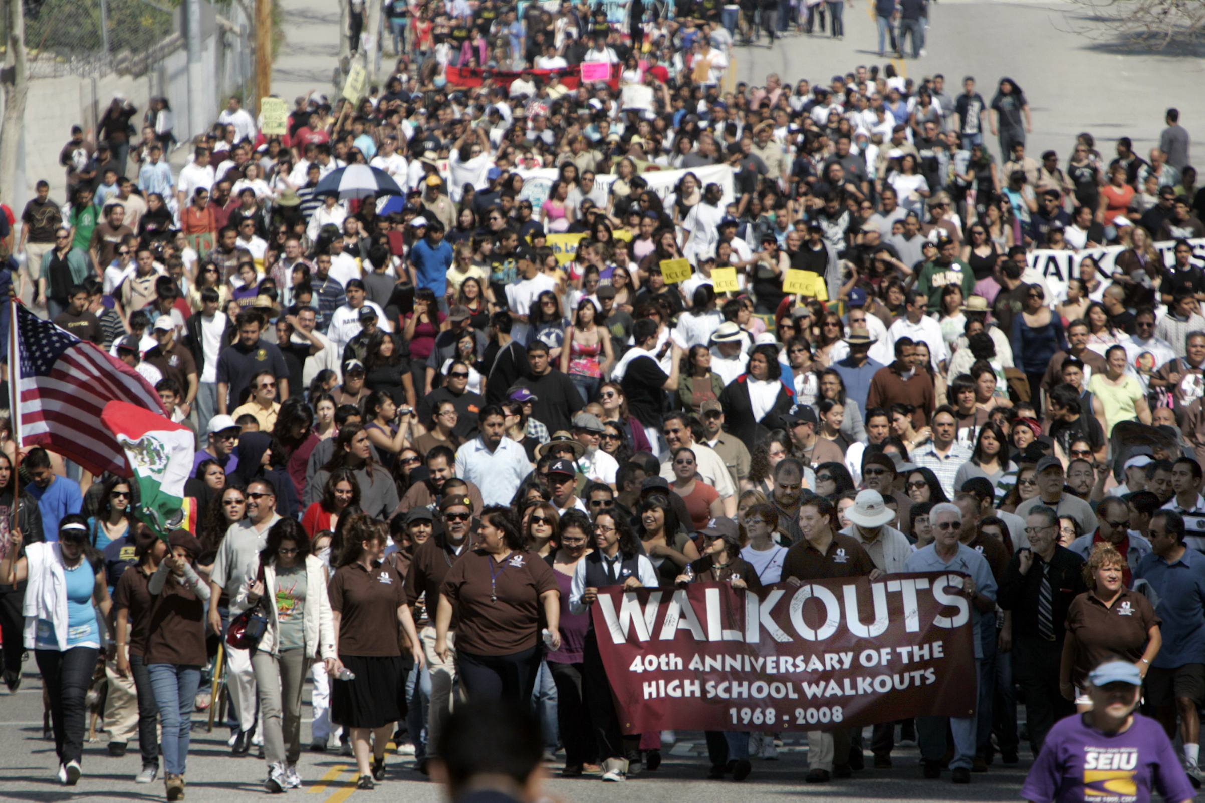On its 40th anniversary, more than a thousand marchers turned to march from Lincoln High School to commemorate the 1968 East LA school walkout that launched the Chicano Civil Rights Movement. (Annie Wells—LA Times / Getty Images)