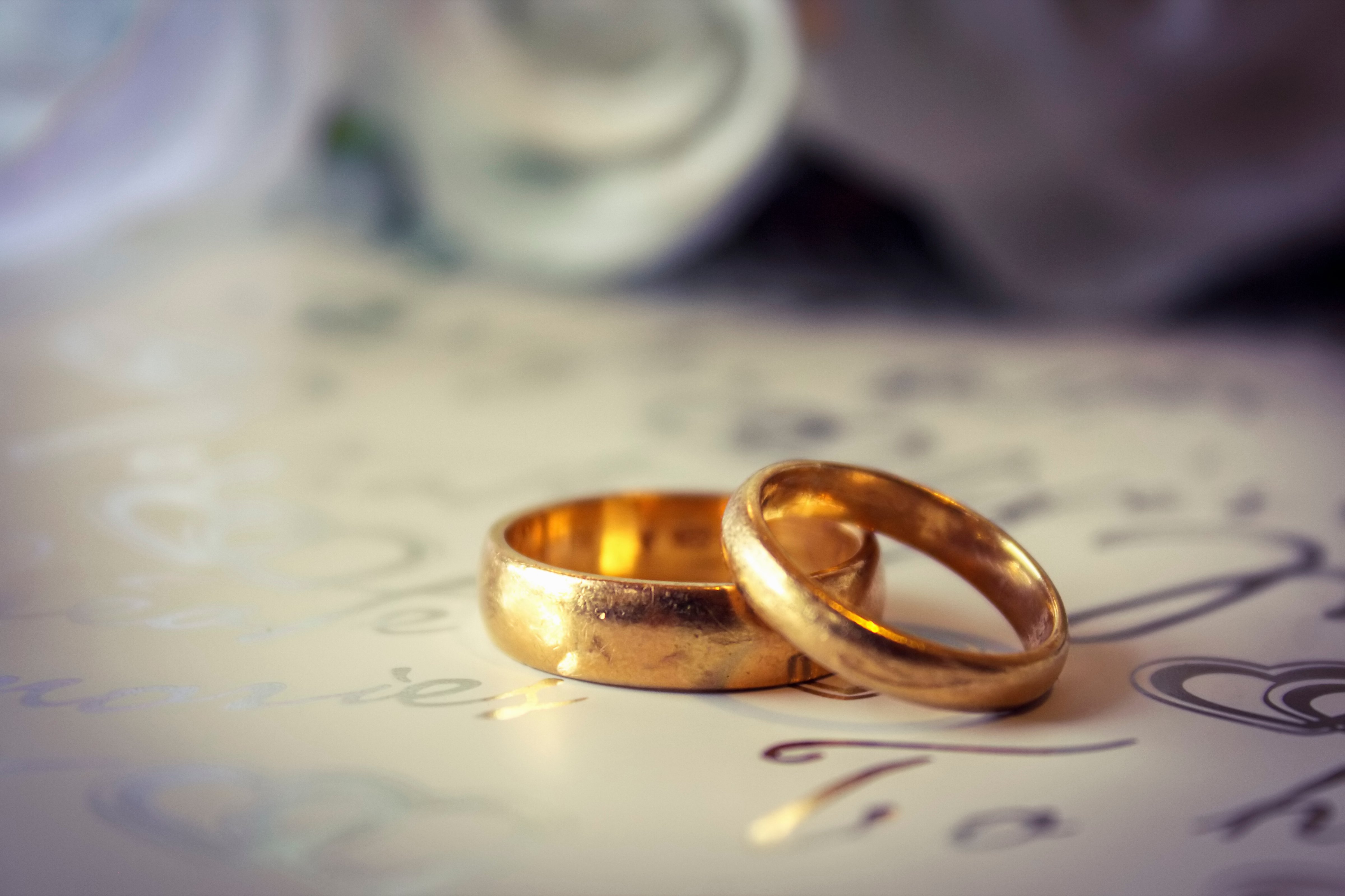 Close up of gold wedding bands.