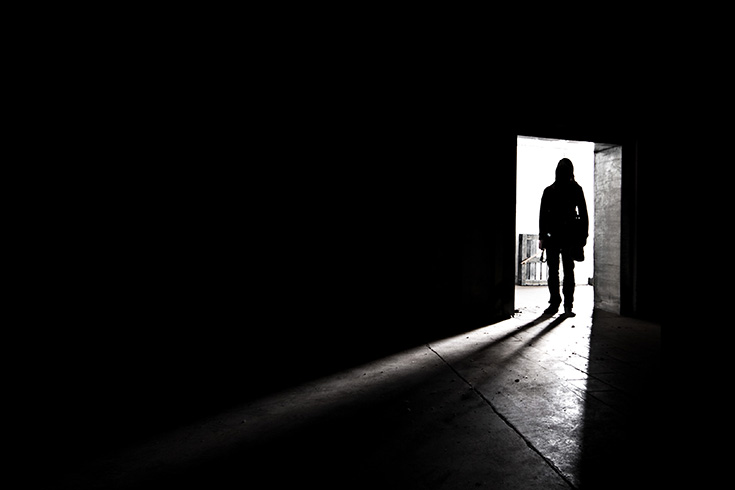 Silhouette shadow of man in doorway