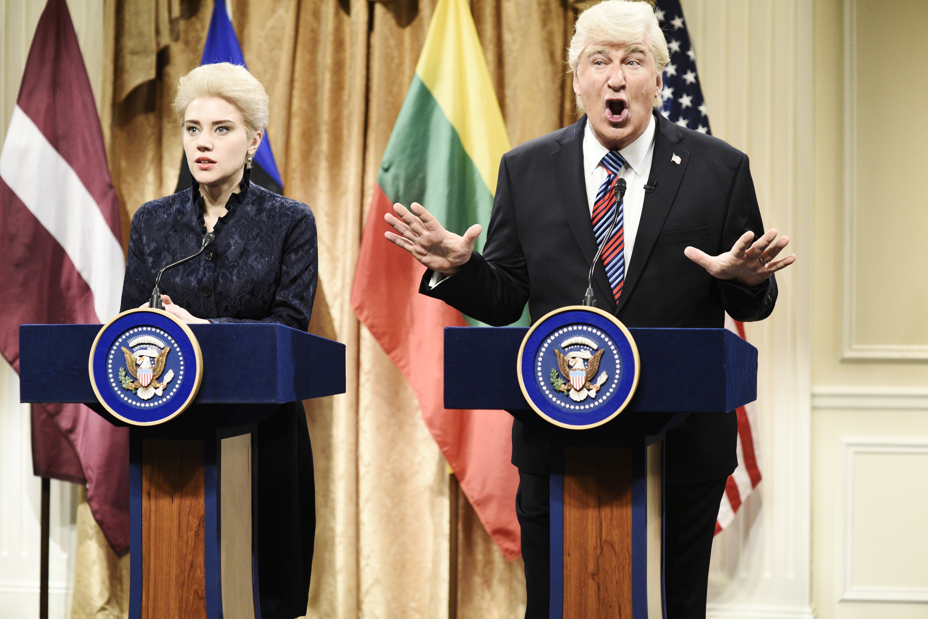 Pictured: (l-r) Kate McKinnon as Dalia Grybauskait, President of Lithuania, Alec Baldwin as President Donald Trump during 'Trump Baltic States Cold Open' in Studio 8H on Saturday, April 7, 2018. (Will Heath - NBC/NBCU Photo Bank/Getty Images)