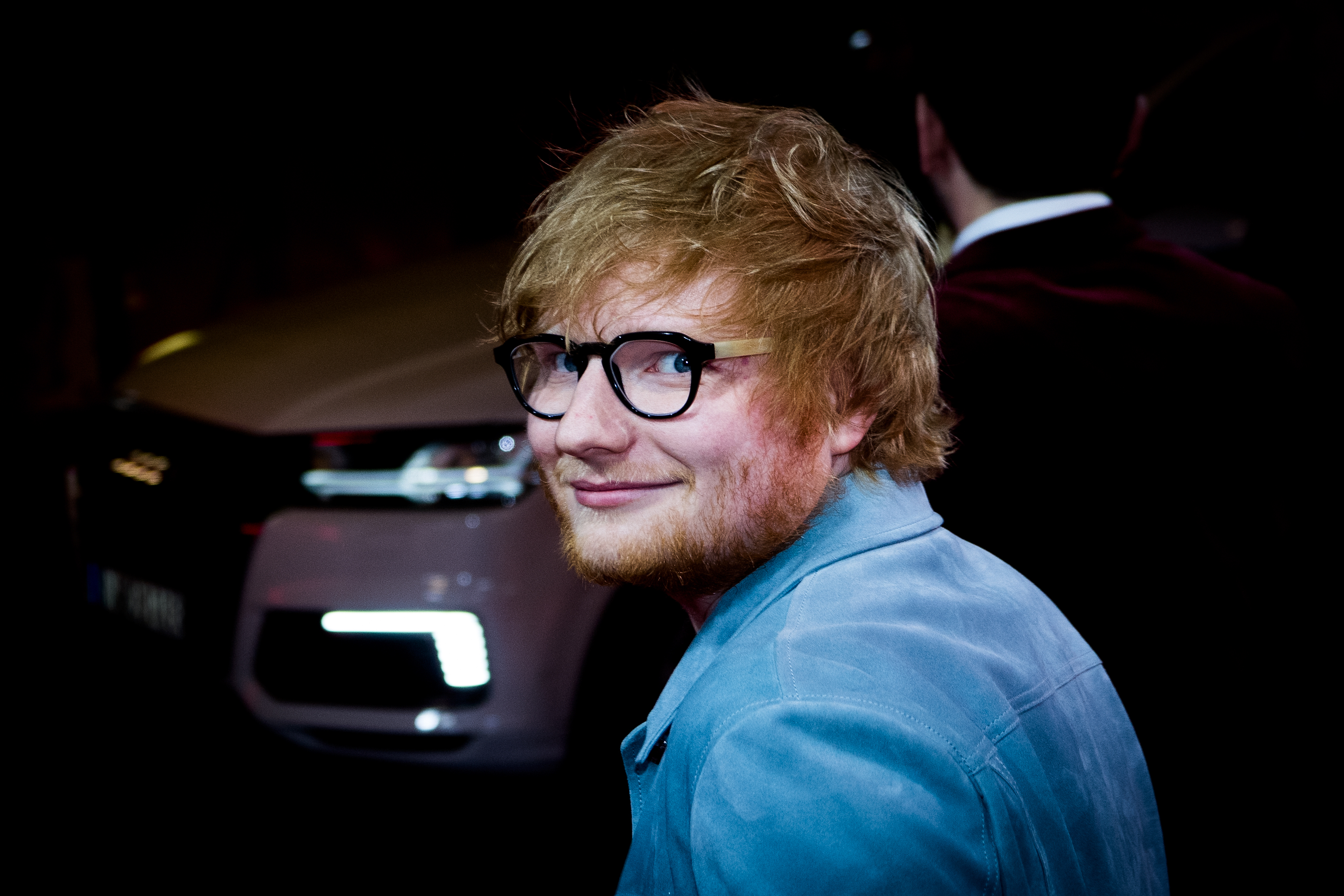 Ed Sheeran leaves the 'Songwriter' premiere during the 68th Berlinale International Film Festival Berlin at Friedrichstadtpalast on February 23, 2018 in Berlin, Germany.