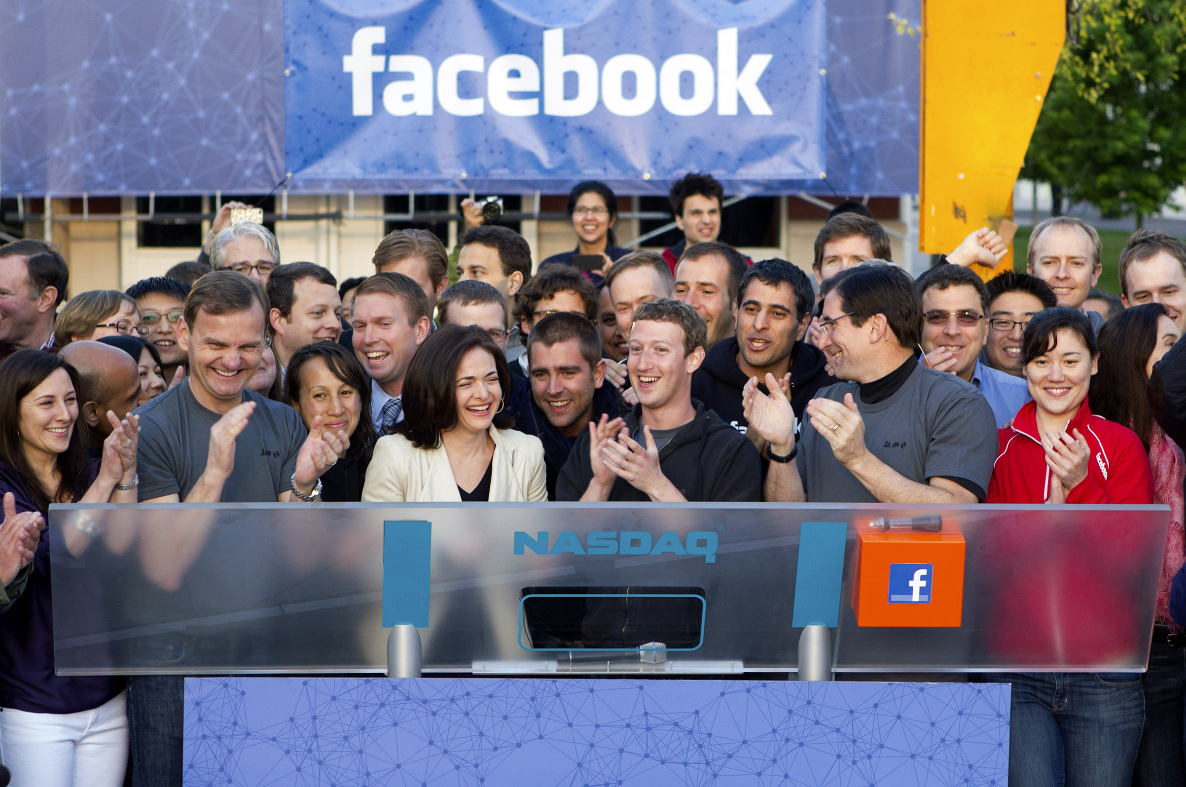 Zuckerberg and Sandberg celebrate Facebook’s May 18, 2012, IPO, which would come to be seen as a wild success (Zef Nikolla—Facebook/Bloomberg/Getty Images)