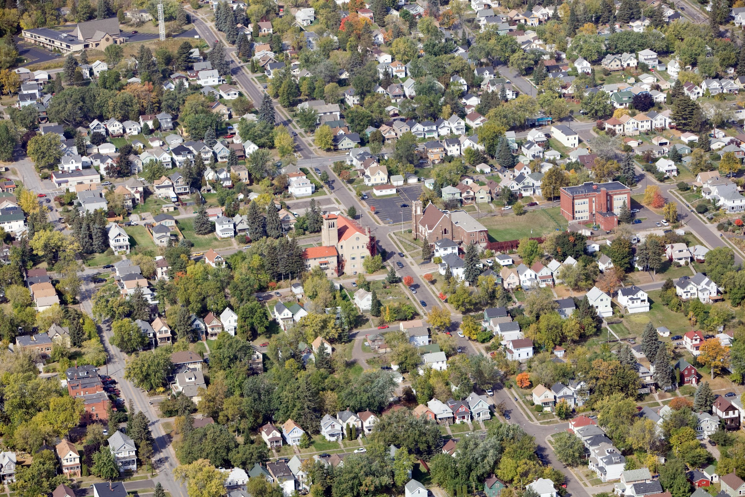 Residential Neighborhood Aerial with Homes, Churches and a School
