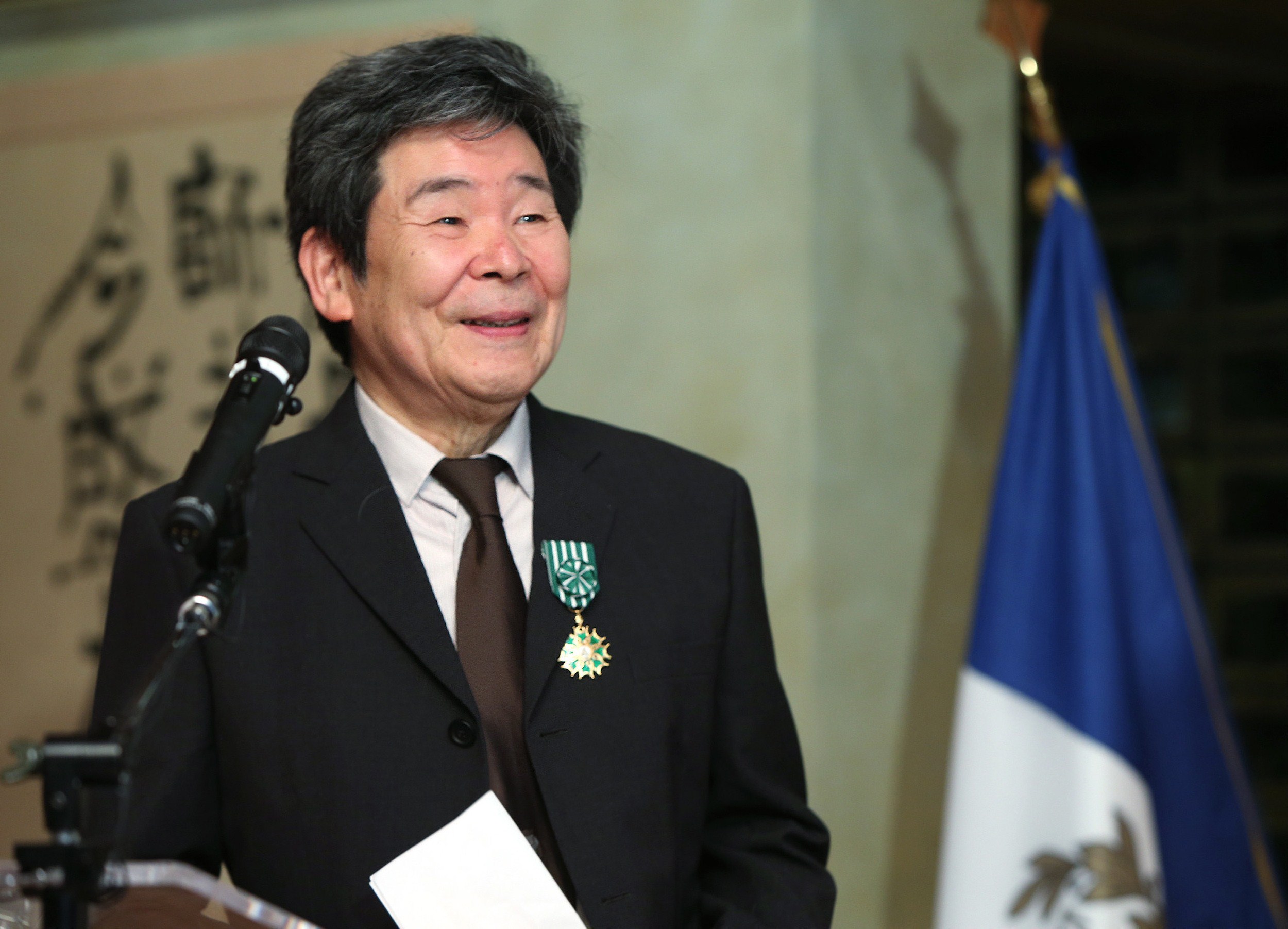 Isao Takahata receives the "Officier of L'Ordre des Arts et des Letters" from French ambassador to Japan Thierry Dana at the French embassy in Tokyo on April 7, 2015. Takahata died on April 5, 2018, aged 82. (Jiji Press—AFP/Getty Images)