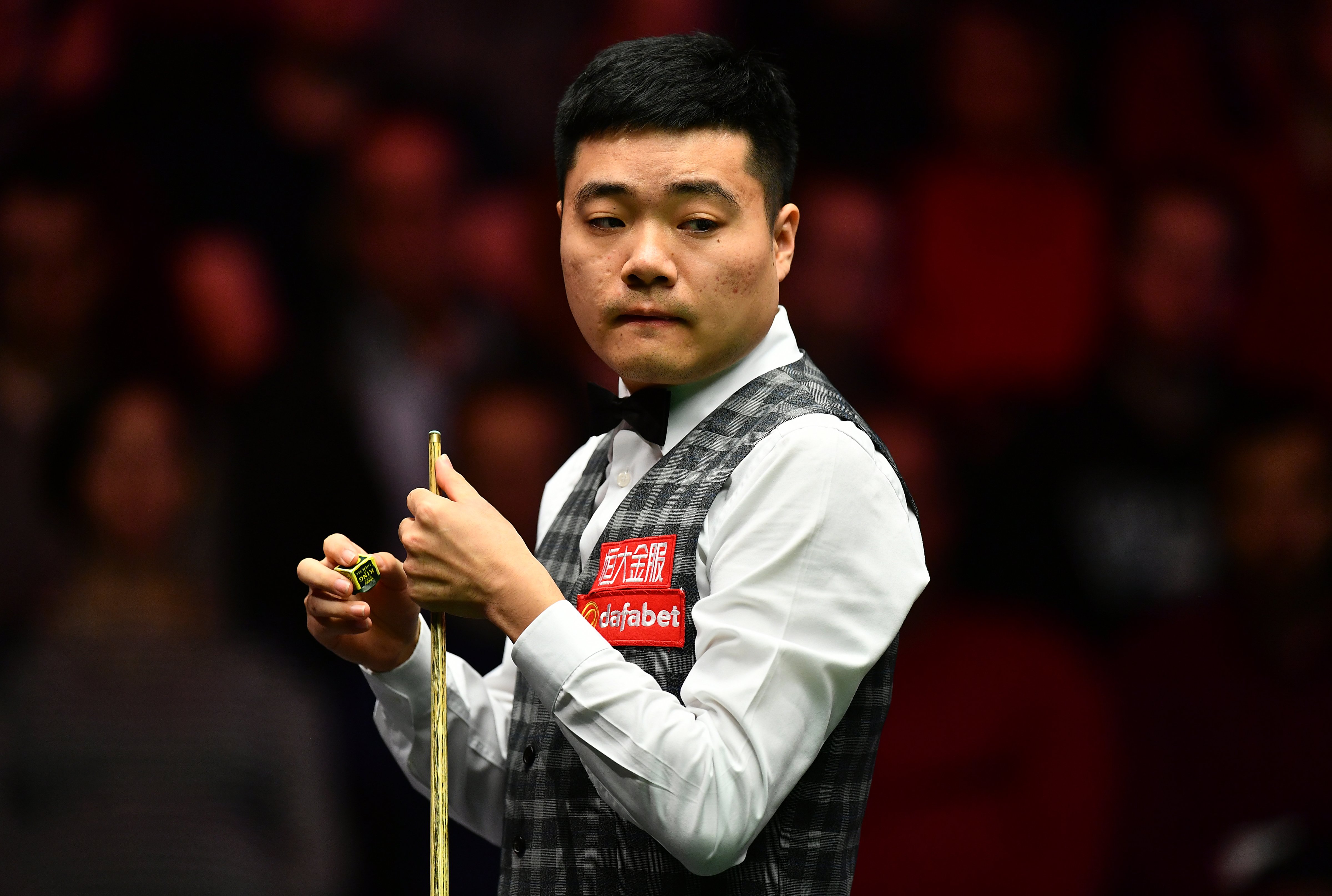 Ding Junhui of China looks on during his first round match against Kyren Wilson of England at the Dafabet Masters in London on Jan. 15, 2017. (Dan Mullan—Getty Images)