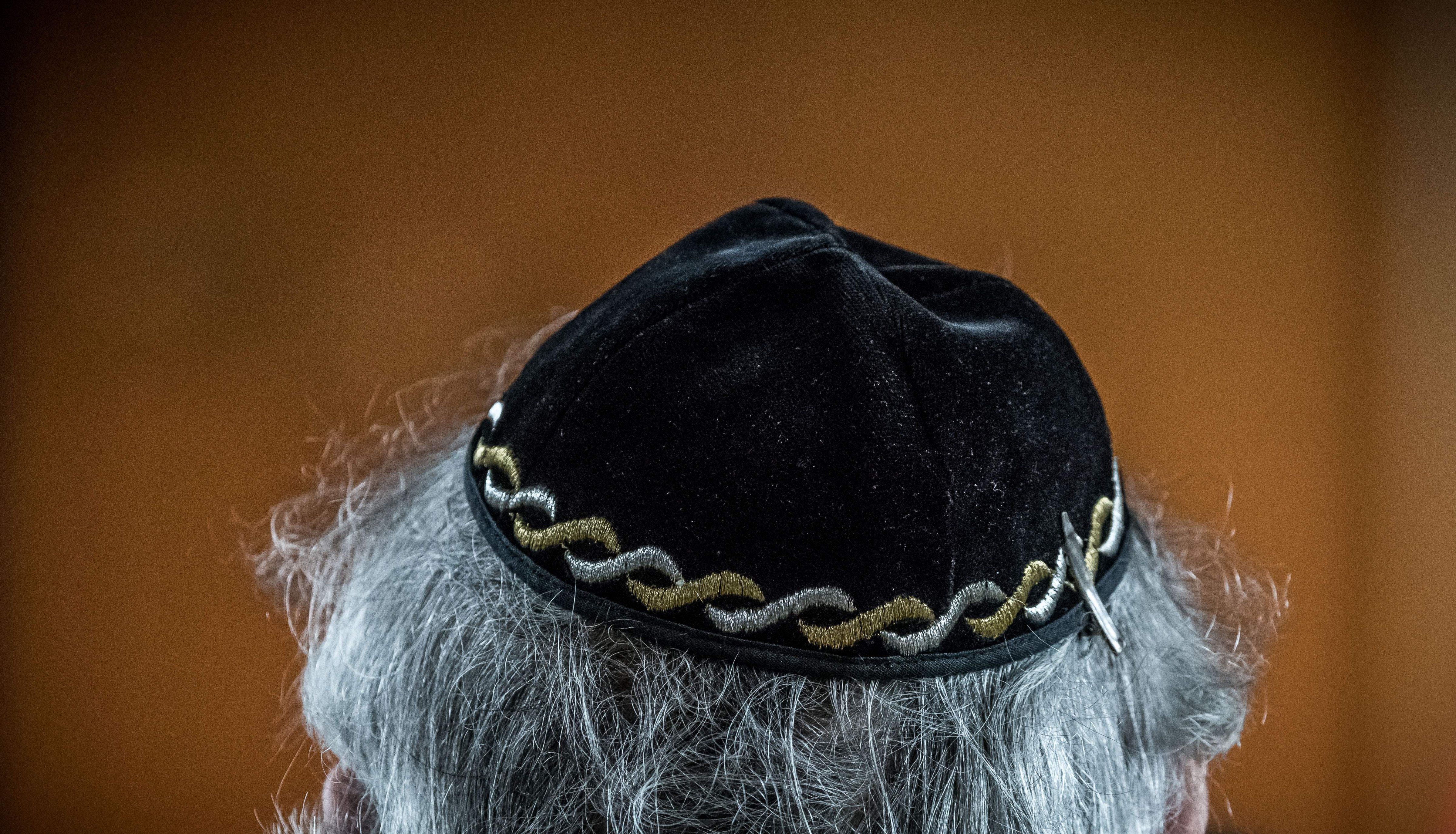 A Jewish man wears a kippa, or Jewish religious skull cap, during a meeting on "the German and French perspectives on immigration, integration and identity" organized by the American Jewish Committee (AJC) in Berlin on April 24, 2018. (Michael Kappeler—AFP/Getty Images)