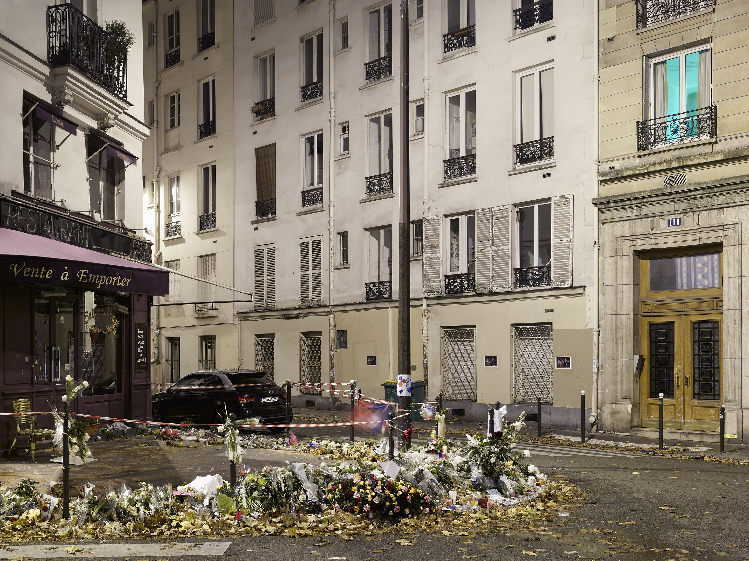 A memorial on the Rue de la Fontaine-au-Roi, in the aftermath of the terror attacks, in Paris on Nov. 18, 2015. (Mark Power—Magnum Photos)