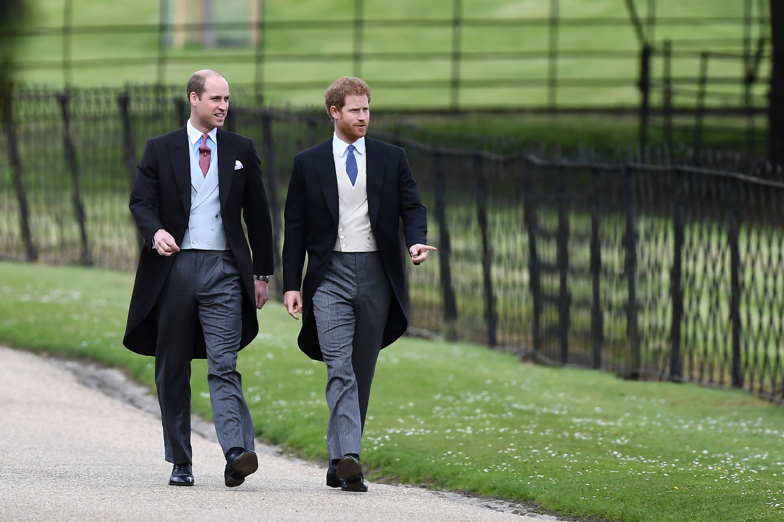 Britain's Prince Harry (R) and Britain's Prince William, Duke of Cambridge attend the wedding of Pippa Middleton and James Matthews at St Mark's Church on May 20, 2017 in Englefield Green, England. (WPA Pool—Getty Images)