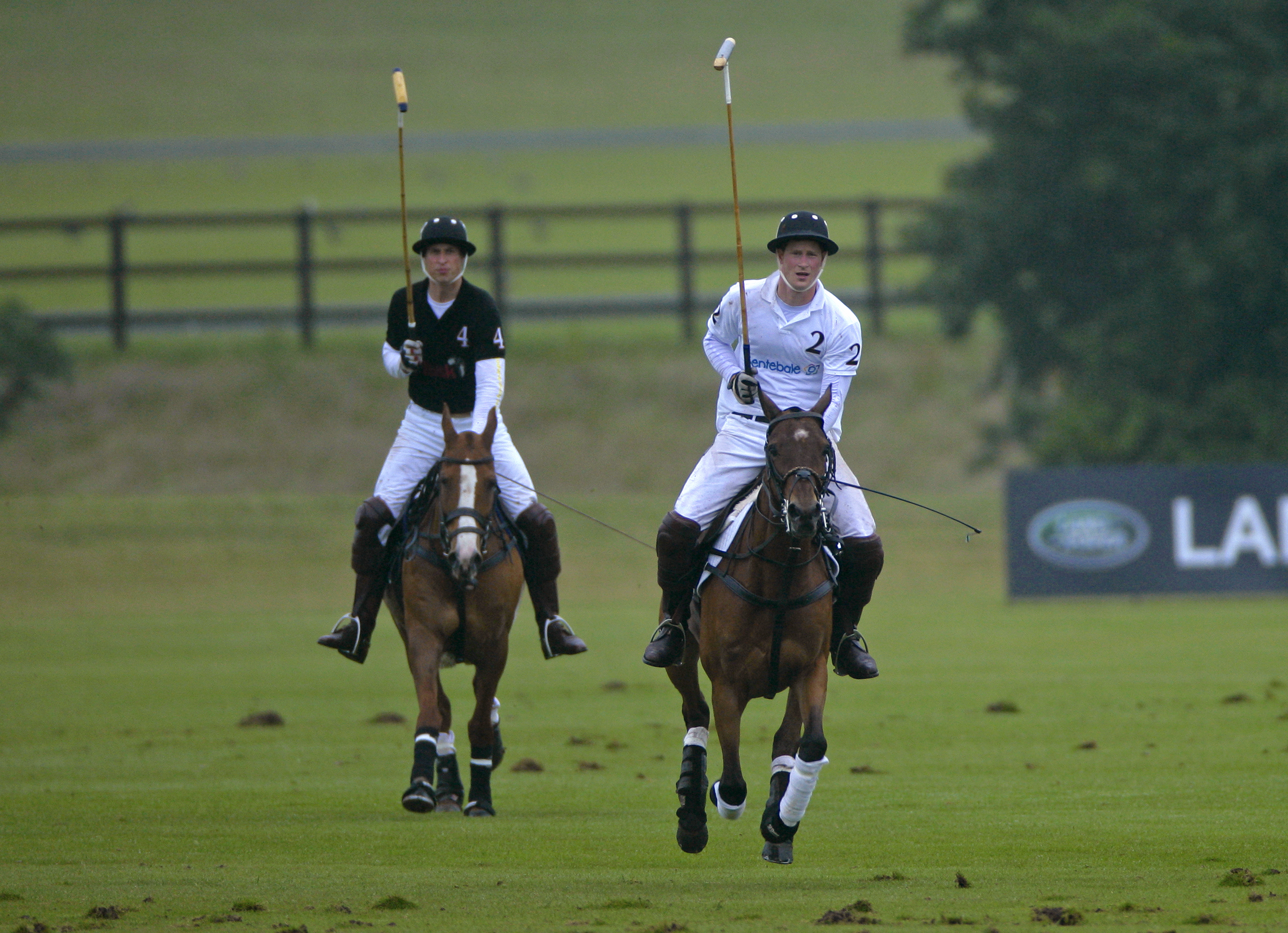 Prince William, Duke of Cambridge and Prince Harry play against each other in the Sentebale Polo Cup polo match at Coworth Park Polo Club on June 12, 2011 in Ascot, United Kingdom. (Max Mumby/Indigo—Getty Images)