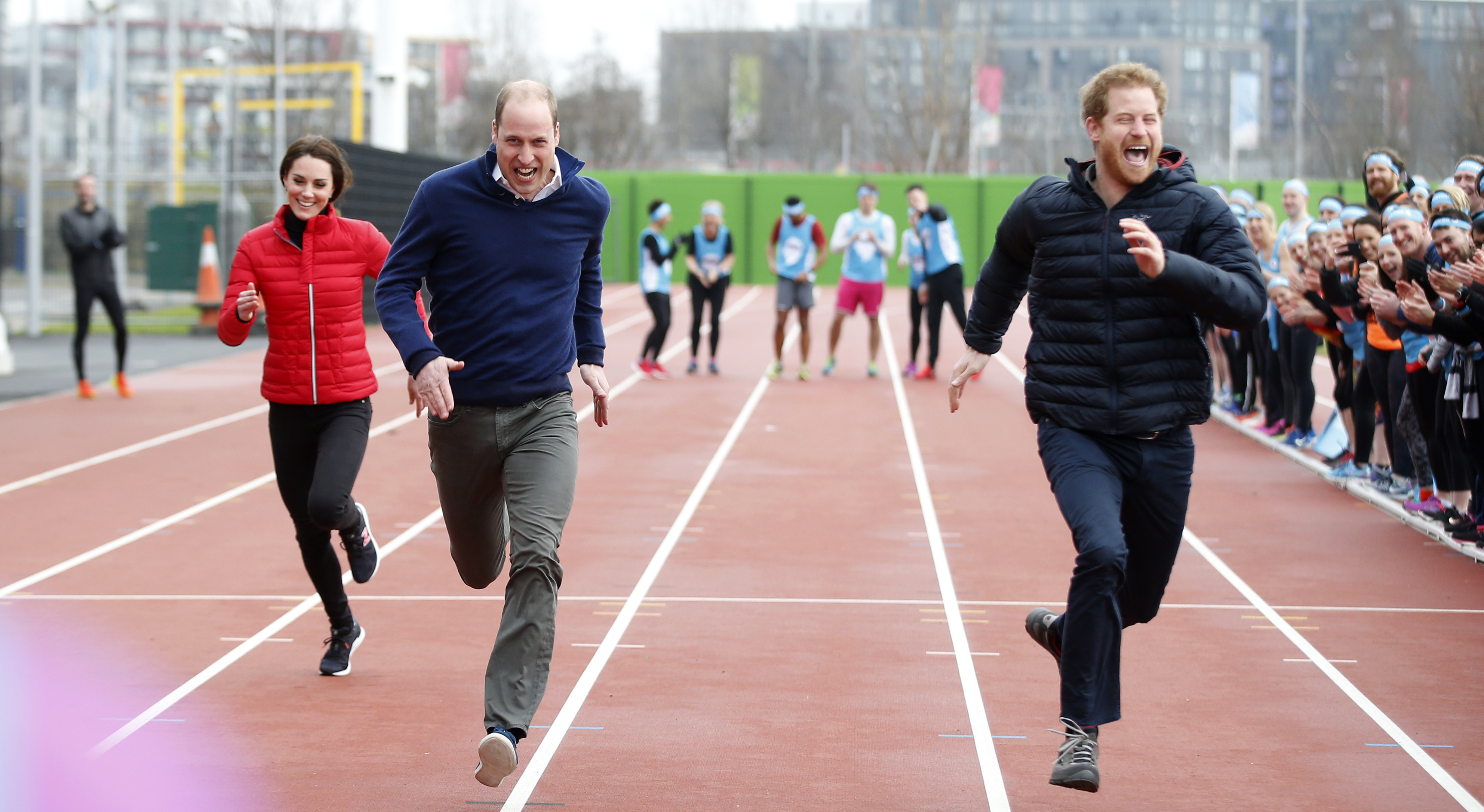 Catherine, Duchess of Cambridge, Prince William, Duke of Cambridge and Prince Harry race during a Marathon Training Day with Team Heads Together at the Queen Elizabeth Olympic Park on February 5, 2017 in London, England. (WPA Pool—Getty Images)