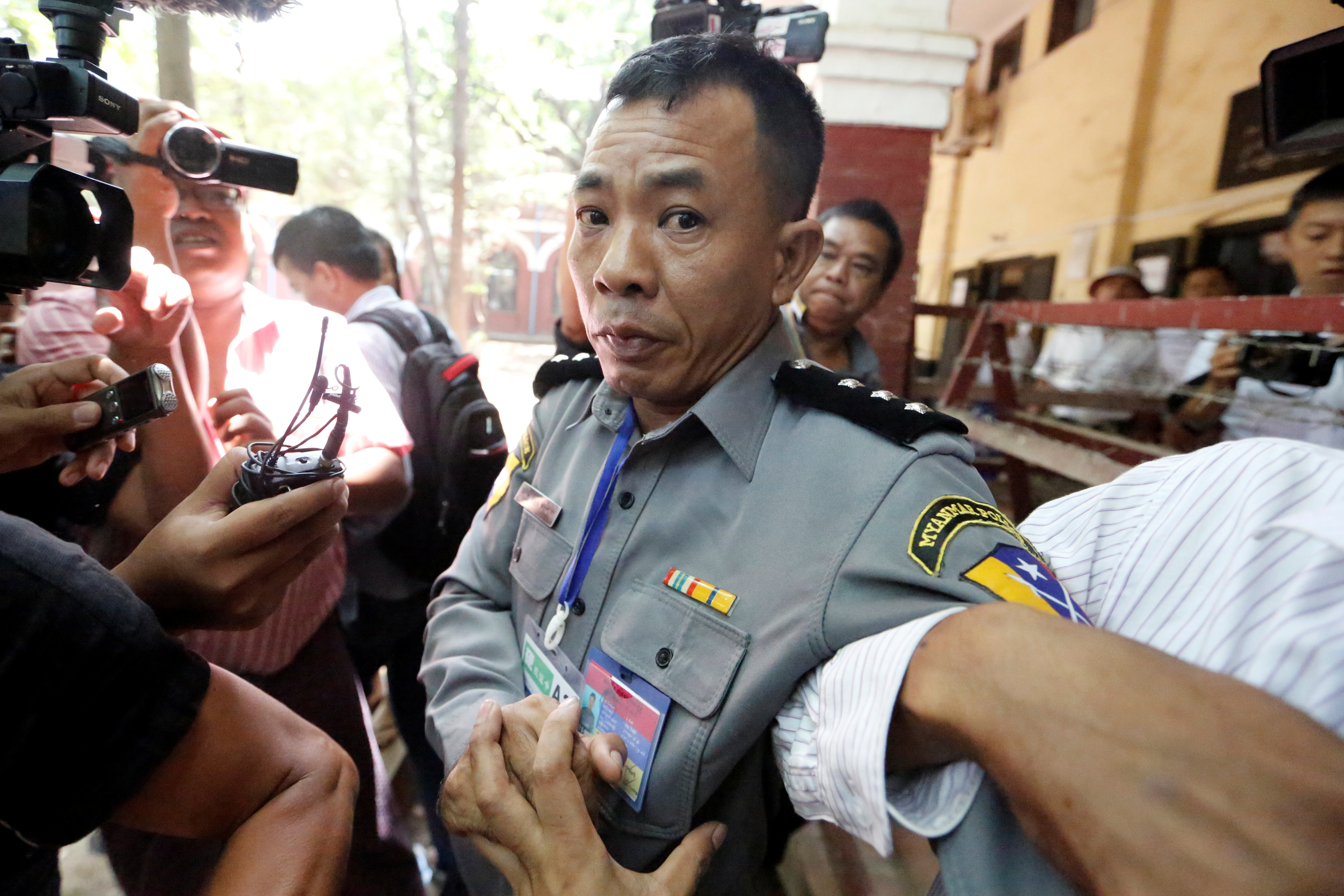 Police captain Moe Yan Naing outside the court room during a hearing of detained Reuters journalists Wa Lone and Kyaw Soe Oo in Yangon, Myanmar April 20, 2018 . (Ann Wang—Stringer/Reuters)