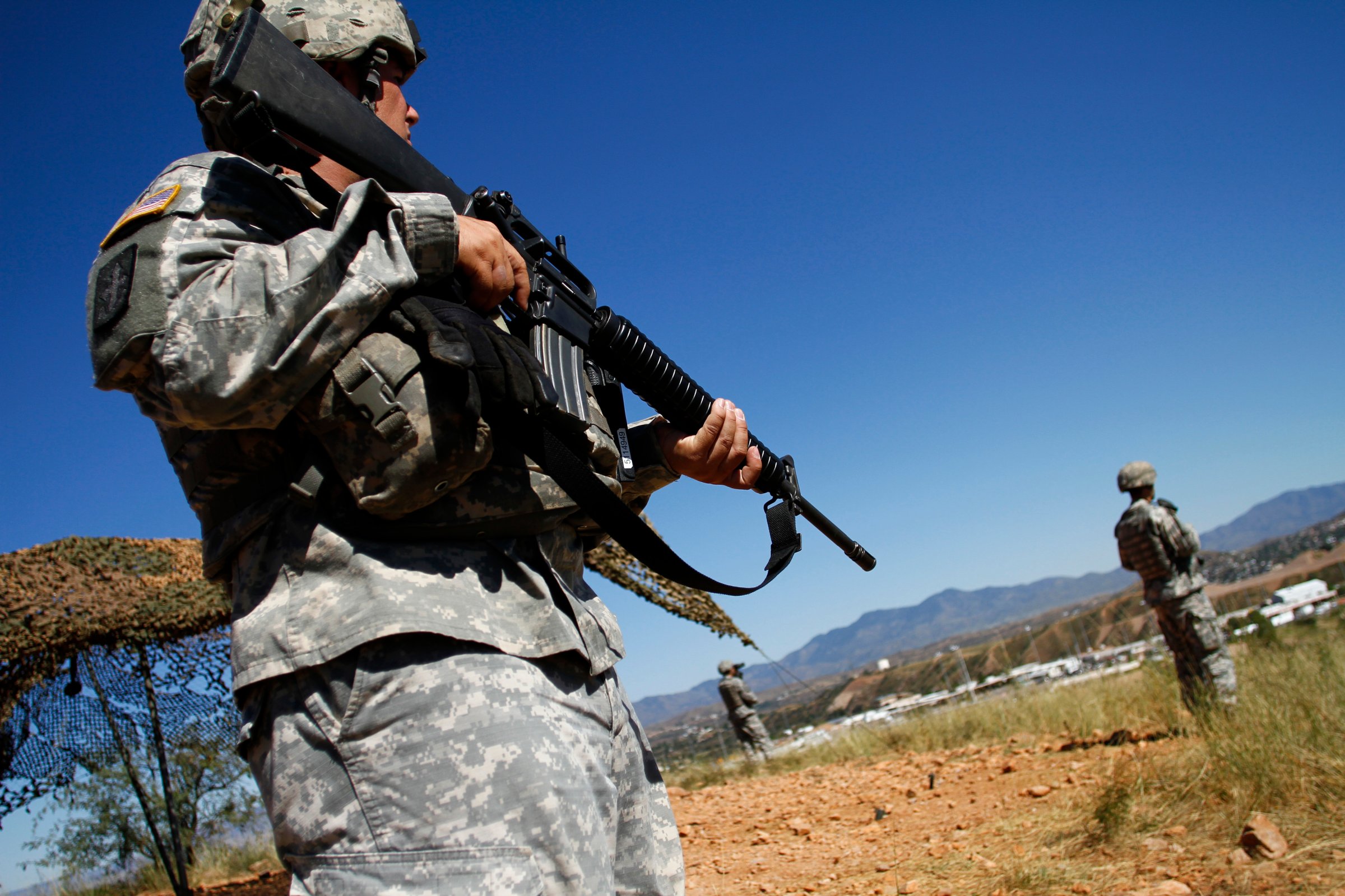 United States National Guard troops patrol along the U.S. and Mexico border in Nogales