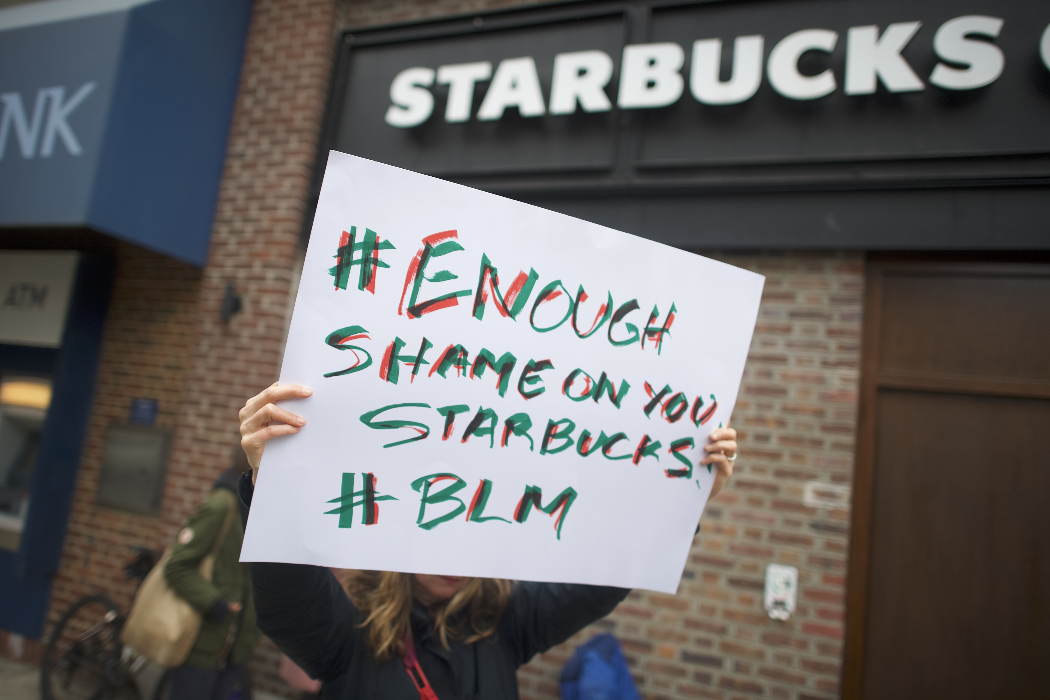 Protestors demonstrate outside a Starbucks on April 15, 2018 in Philadelphia, Pennsylvania. (Mark Makela/Getty Images)