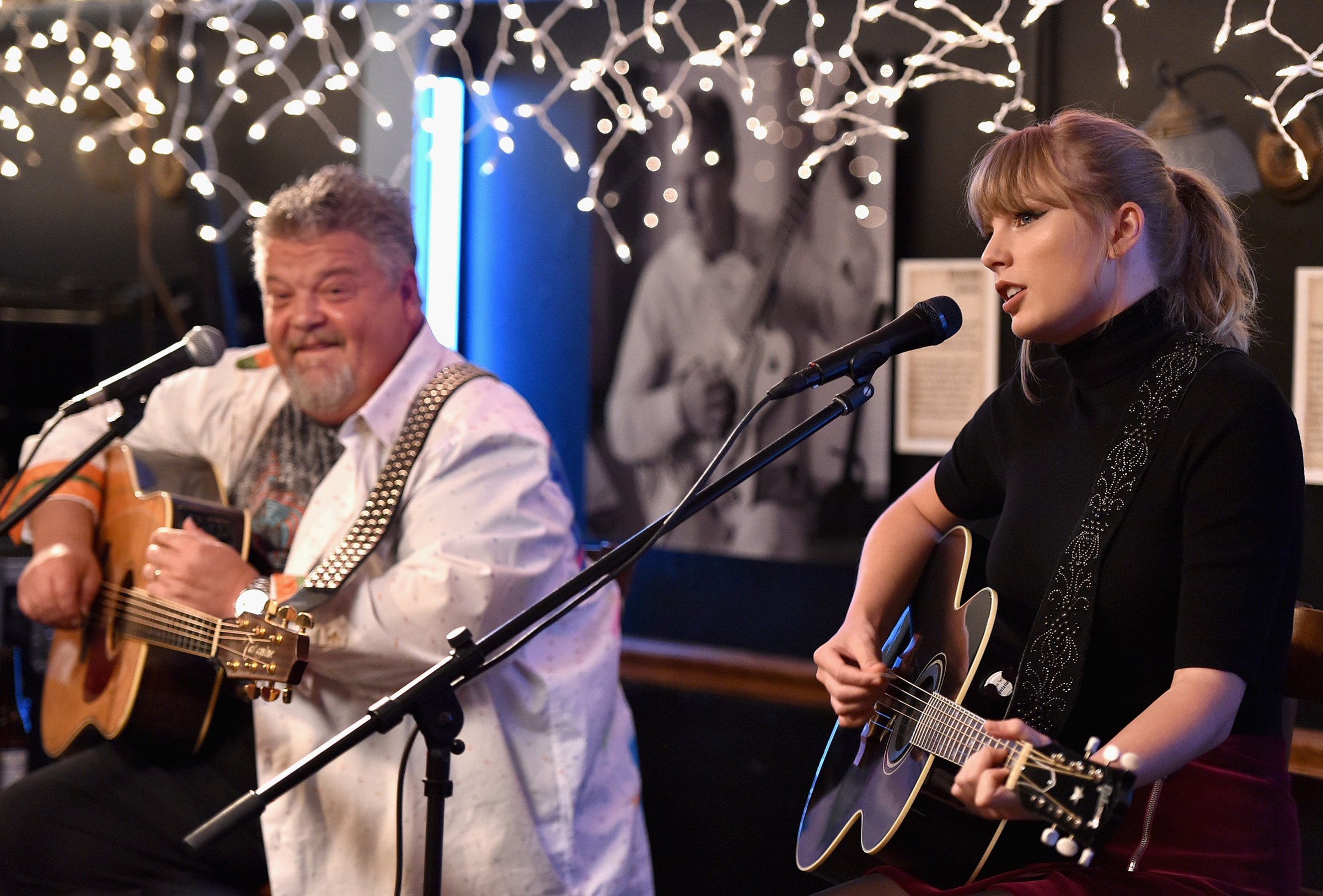 Craig Wiseman and special guest Taylor Swift perform onstage at Bluebird Cafe on March 31, 2018 in Nashville.