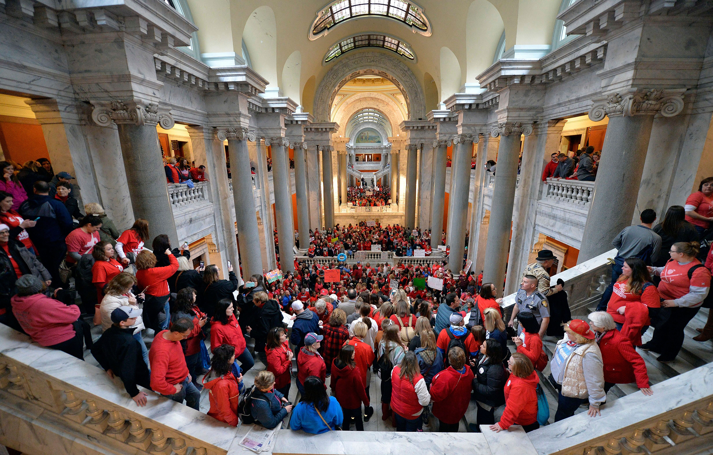 Kentucky teachers fill the state capitol on April 2 to protest pension changes and budget cutThousands of teachers from across Kentucky fill the state Capitol to rally for increased funding and to protest last minute changes to their state funded pension system, in Frankfort, Ky. Thousands filled the state Capitol to protest teacher pension changes, and schools were closed statewide in Oklahoma as thousands more educators rallied for increased education funding
                      Teacher Protests, Frankfort, USA - 02 Apr 2018 (Timothy D. Easley—AP/Shutterstock)