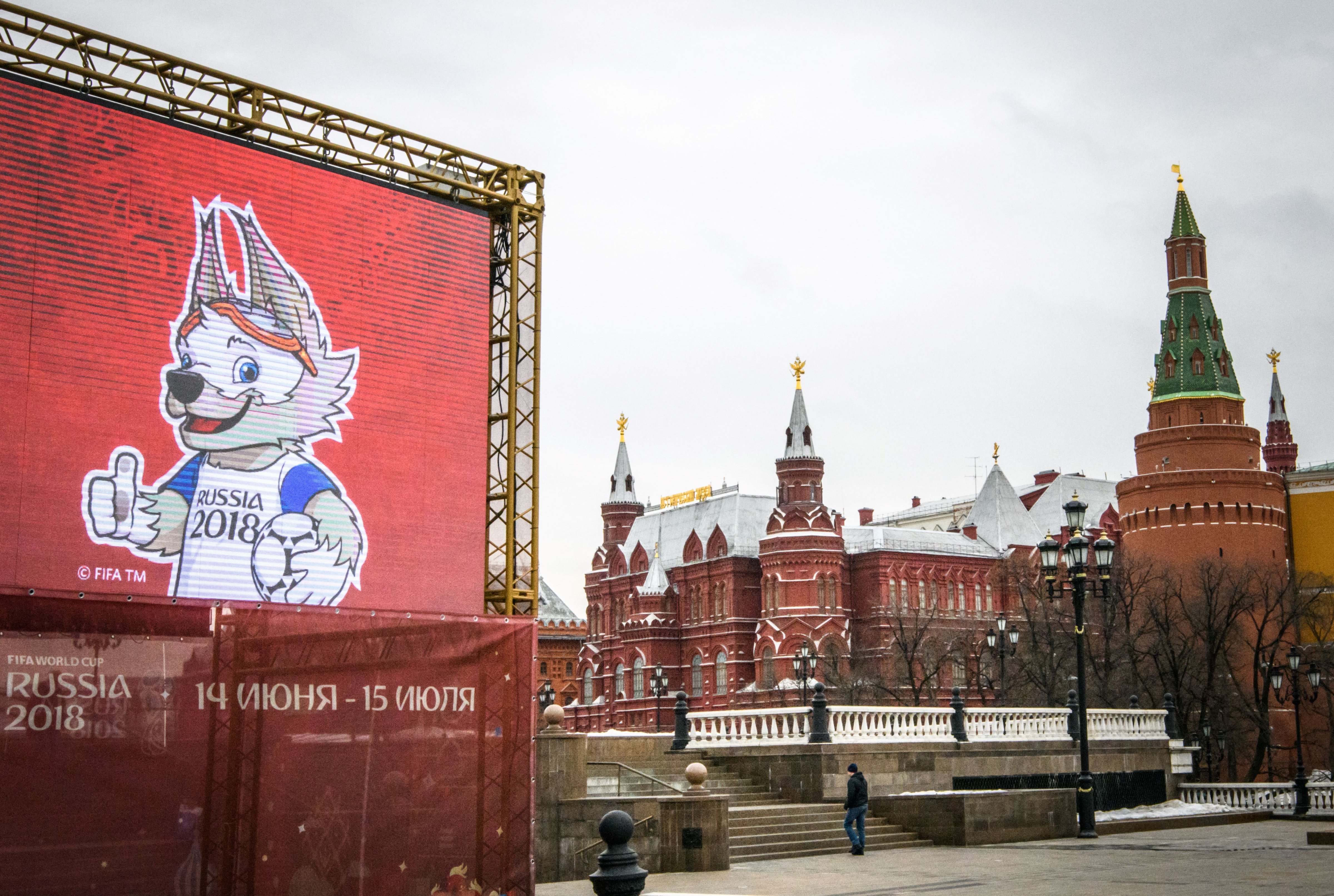 A man takes a photo of a statue of Zabivaka, the official mascot for the 2018 FIFA World Cup, in Manezhnaya square in downtown Moscow on April 2, 2018. MLADEN ANTONOV/AFP/Getty Images (MLADEN ANTONOV&mdash;AFP/Getty Images)