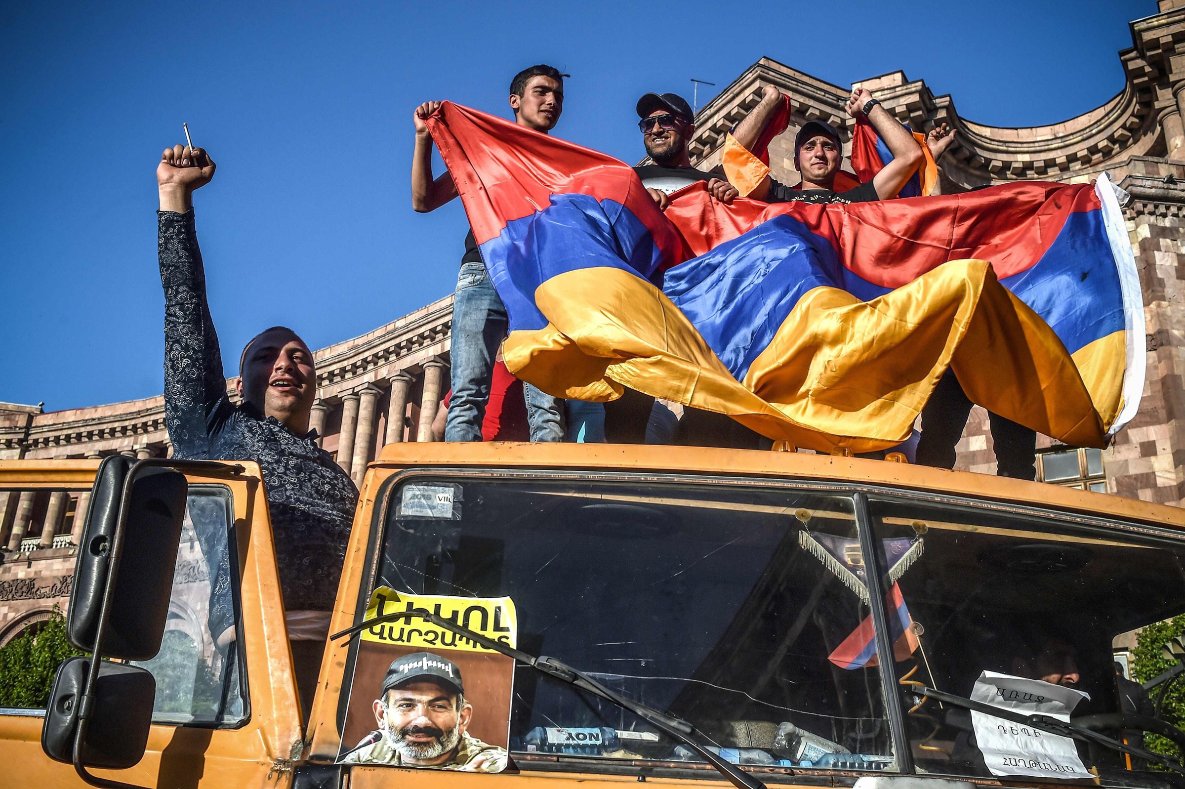 Armenian Protesters in Yerevan on truck with photo of Pashinyan