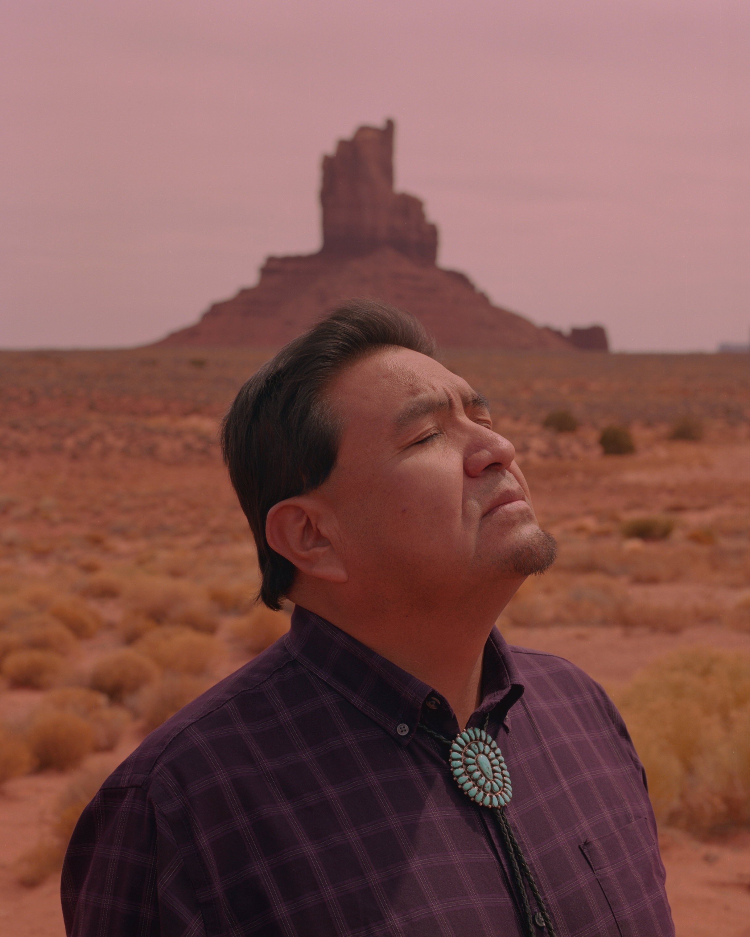 James Adakai, a Navajo tribal leader and commissioner, in front of the Big Chief Mesa in Monument Valley.Adakai was selected as commissioner of the Bears Ears Coalition to protect the land during Obama's presidency. Now residing in Window Rock, AZ, he frequently makes hour long trips to Monument Valley and Bears Ears for meetings and efforts towards the fight to protect the land. (Ryan Shorosky for TIME)