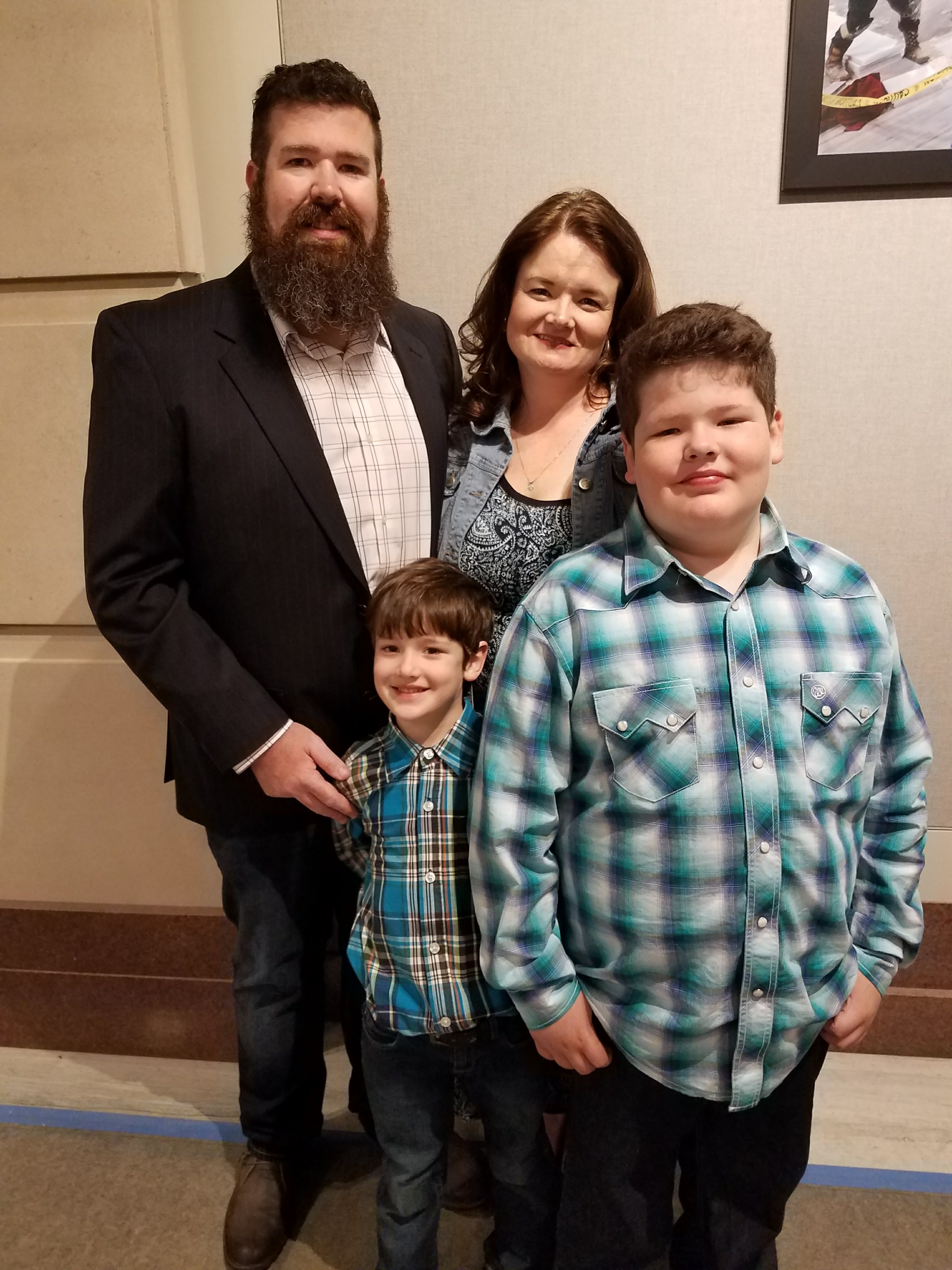 Teacher Casey Satterlee stands with his wife, Lisa, and sons, Ayden and Lewis, on the day he filed to run for office during the teacher walkout in Oklahoma. (Courtesy of Casey Satterlee)