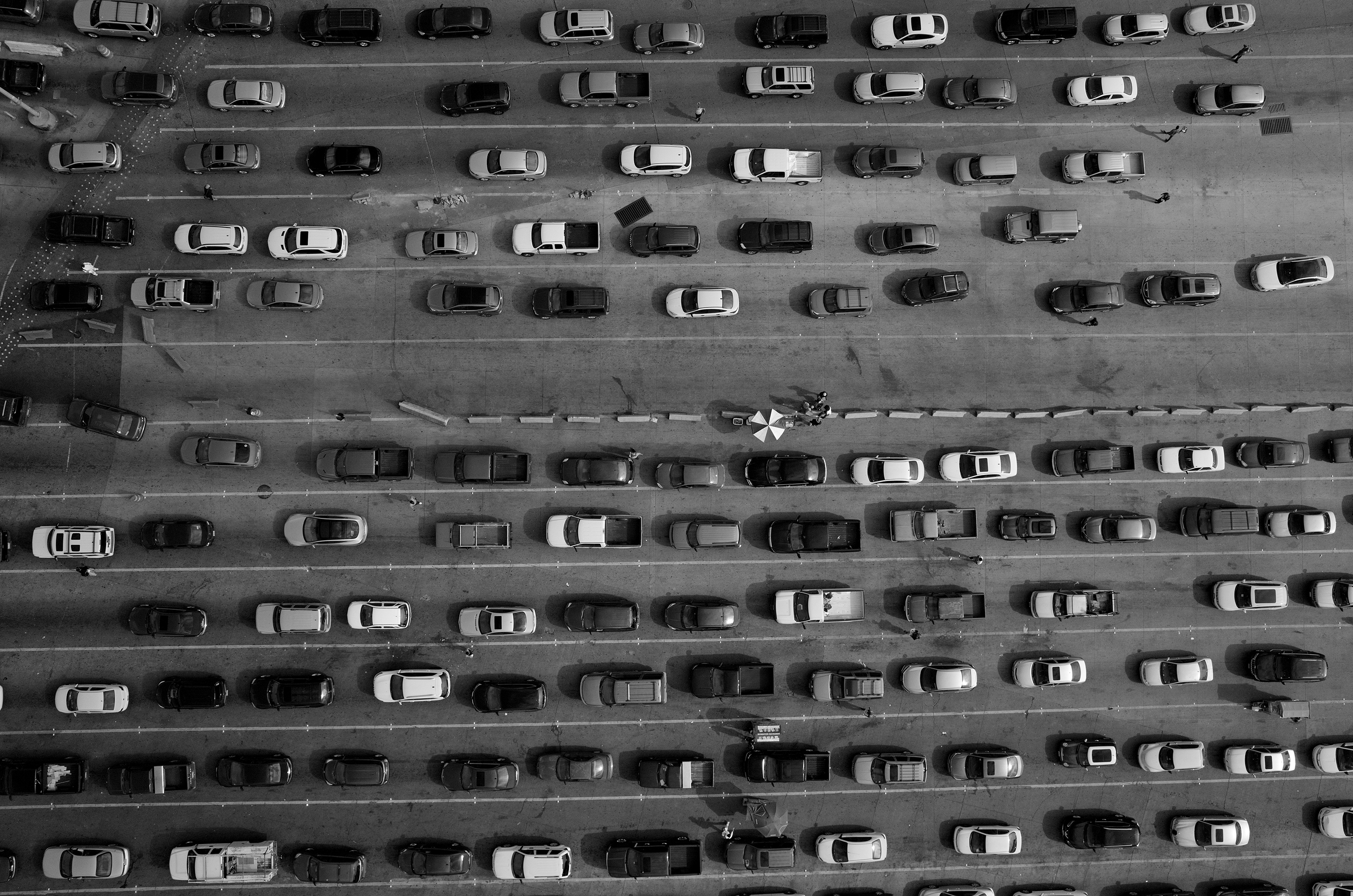 Lanes of cars line up along the U.S.-Mexico border at the port of entry at San Ysidro, California and Tijuana, Baja California. The port is the largest land border crossing point in the world. (Tomas van Houtryve—VII)