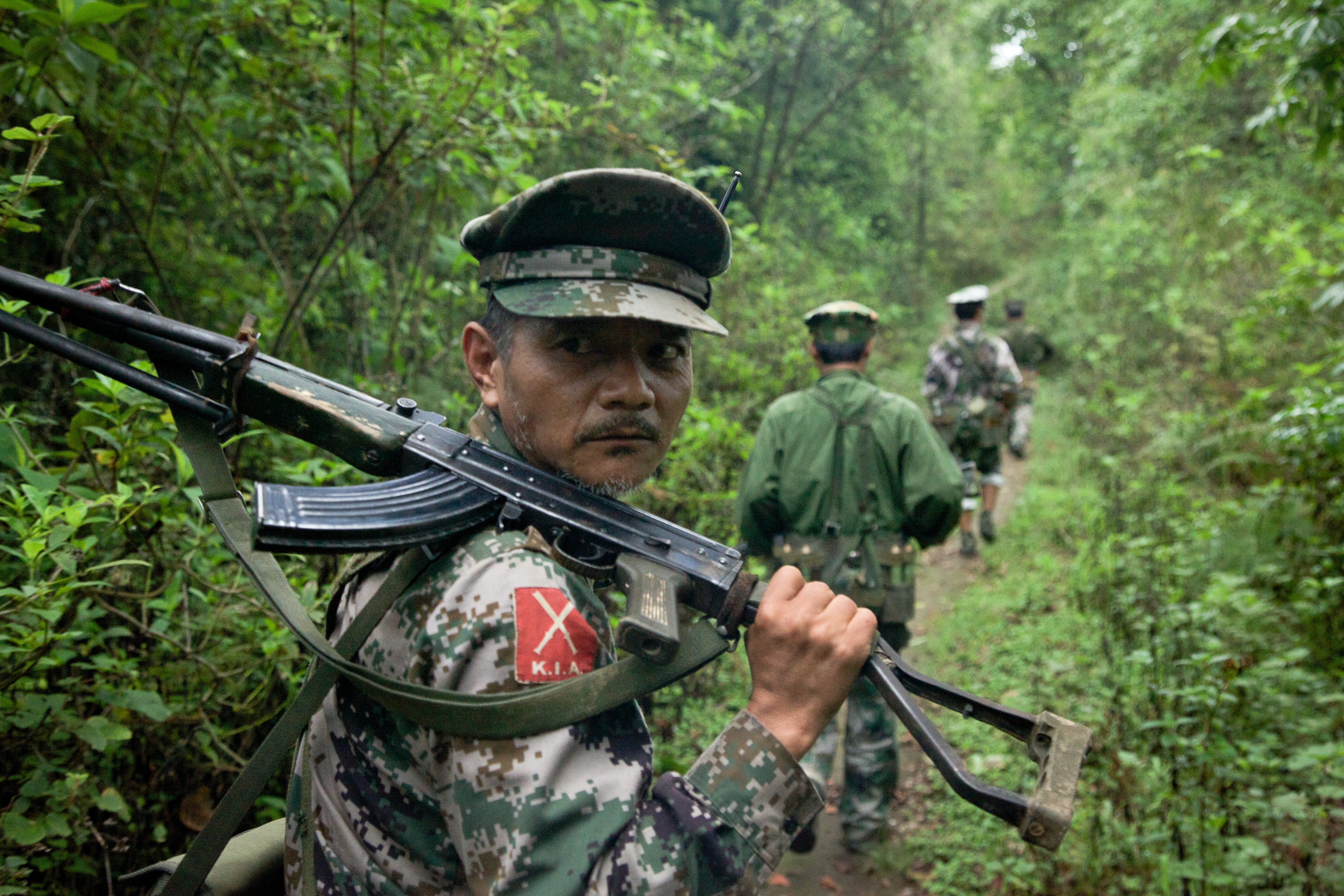 A Kachin Independence Army soldier patrols the frontline area on June 16, 2012. Fighting between the Myanmar army and KIA has escalated since early May, displacing 5,000 people in Kachin state. (Jason Motlagh—The Washington Post/Getty Images)
