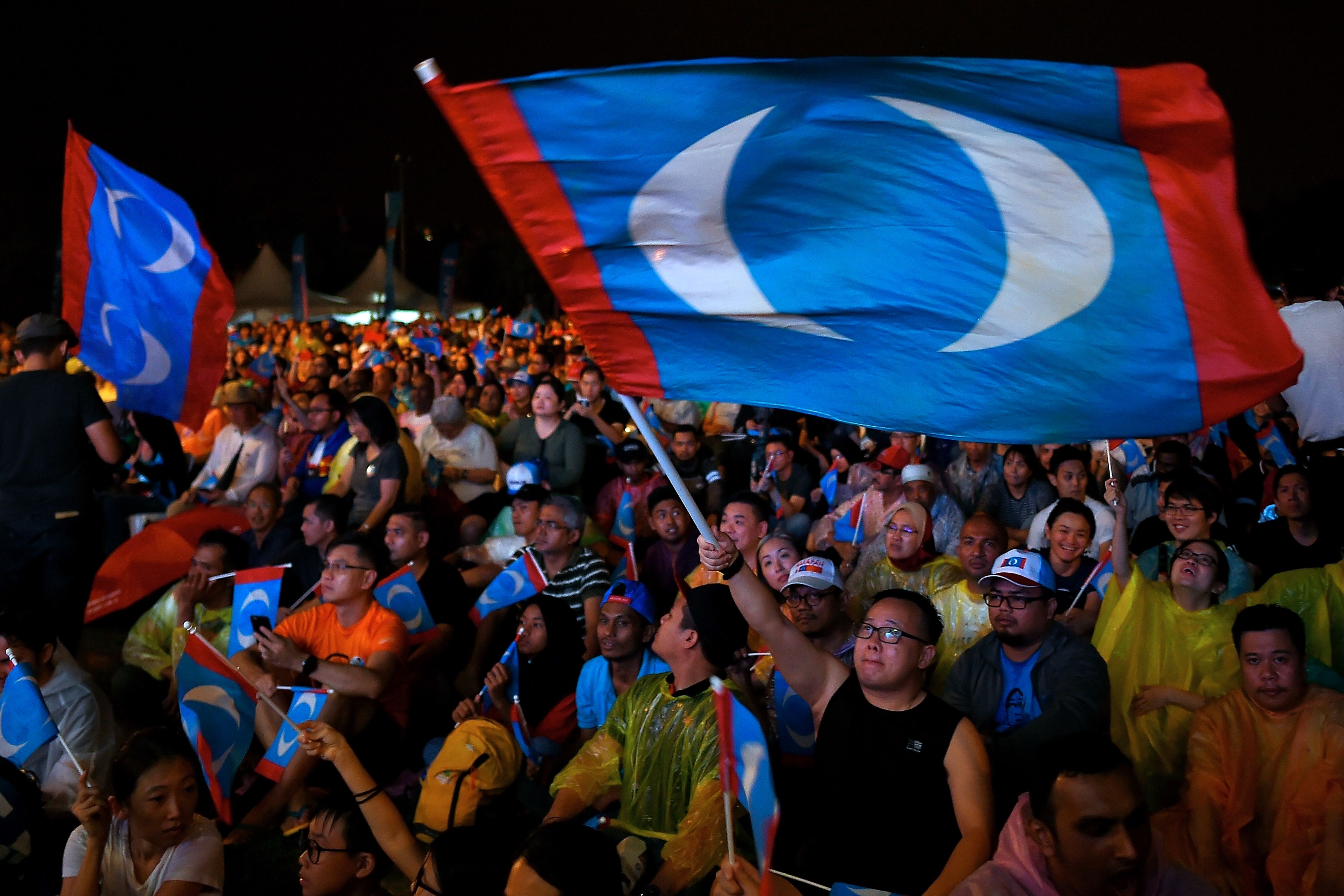 Supporters of former Malaysian prime minister and opposition party Pakatan Harapan's candidate Mahathir Mohamad attend a campaign rally ahead of the upcoming general elections to be held on May 9. (Manan Vatsyayan—AFP/Getty Images)