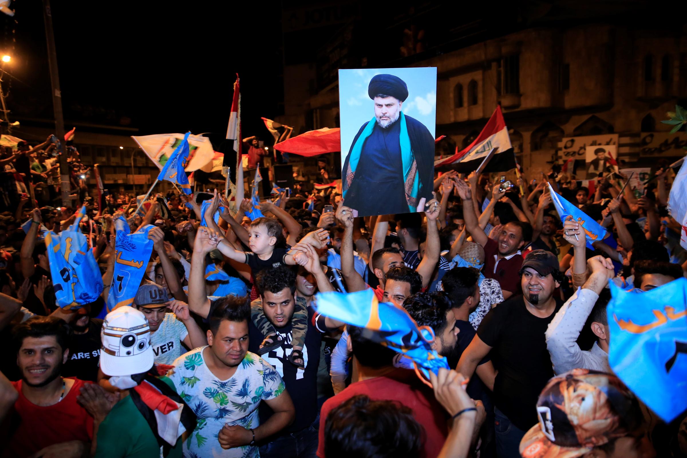 Supporters of Shiite cleric al-Sadr celebrate Election Results in Baghdad