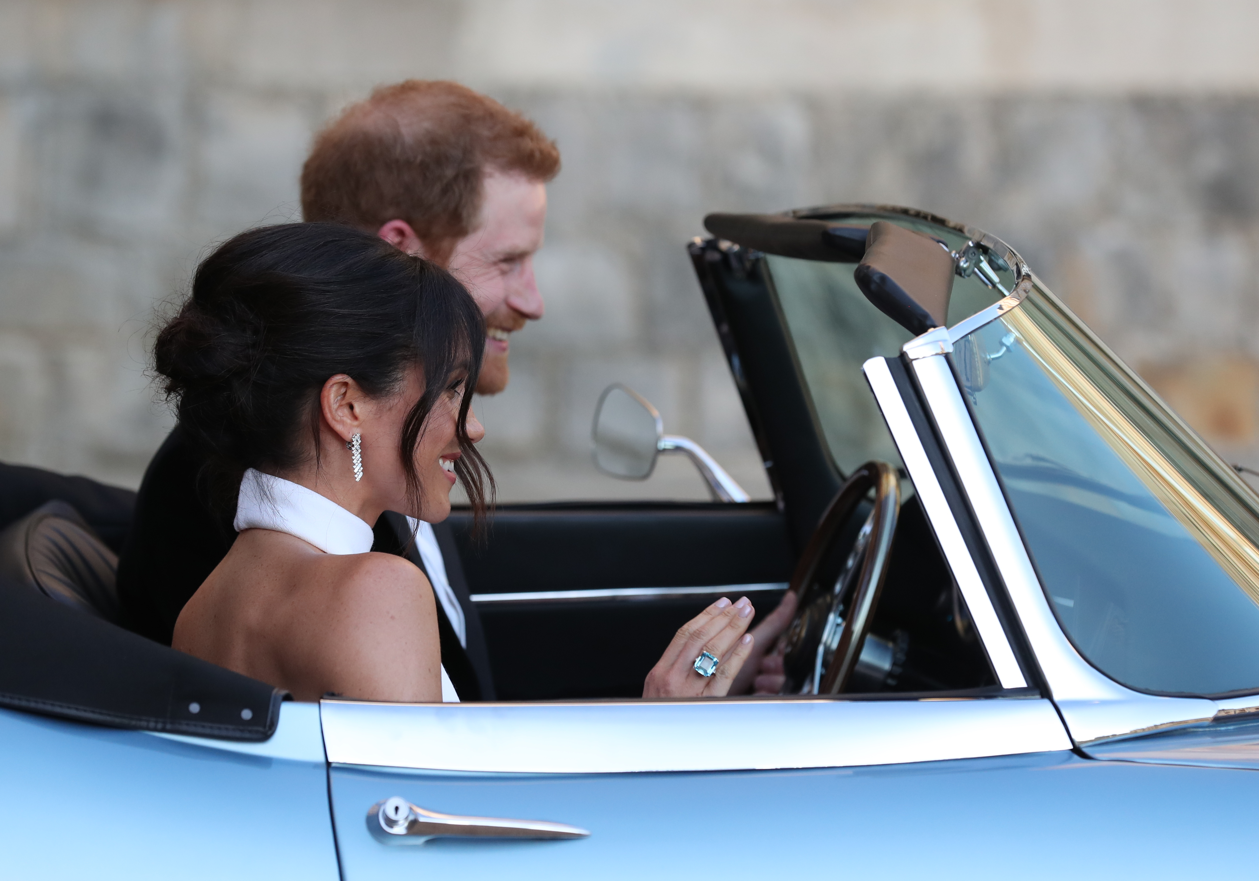 Duchess of Sussex and Prince Harry leaving Windsor Castle for an evening reception at Frogmore Hous on May 19, 2018. (Photo by Steve Parsons - WPA Pool/Getty Images) (WPA Pool&mdash;Getty Images)
