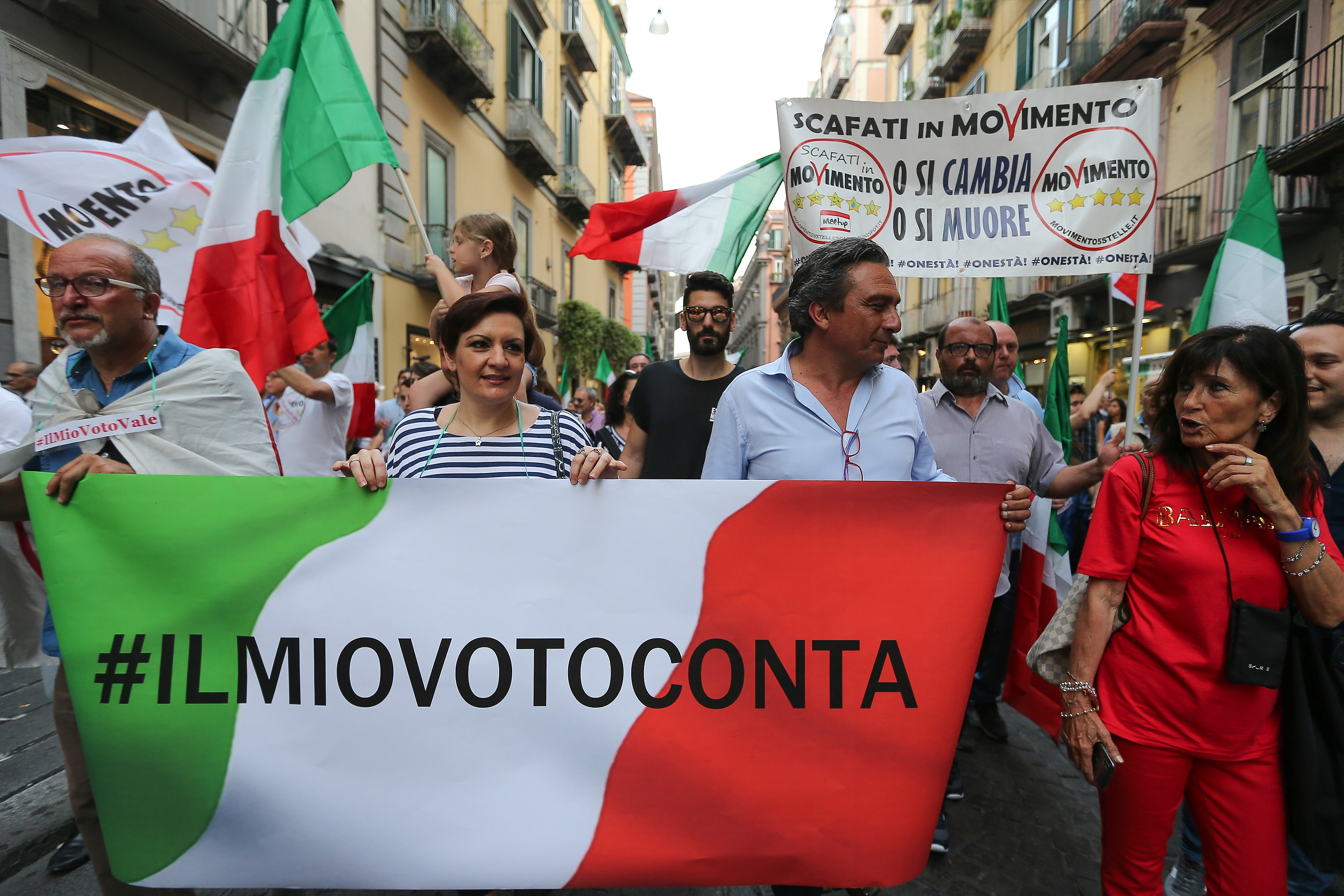 Supporters of the political Movement 5 Stars before the rally of the leader Luigi Di Maio. (Marco Cantile—LightRocket via Getty Images)