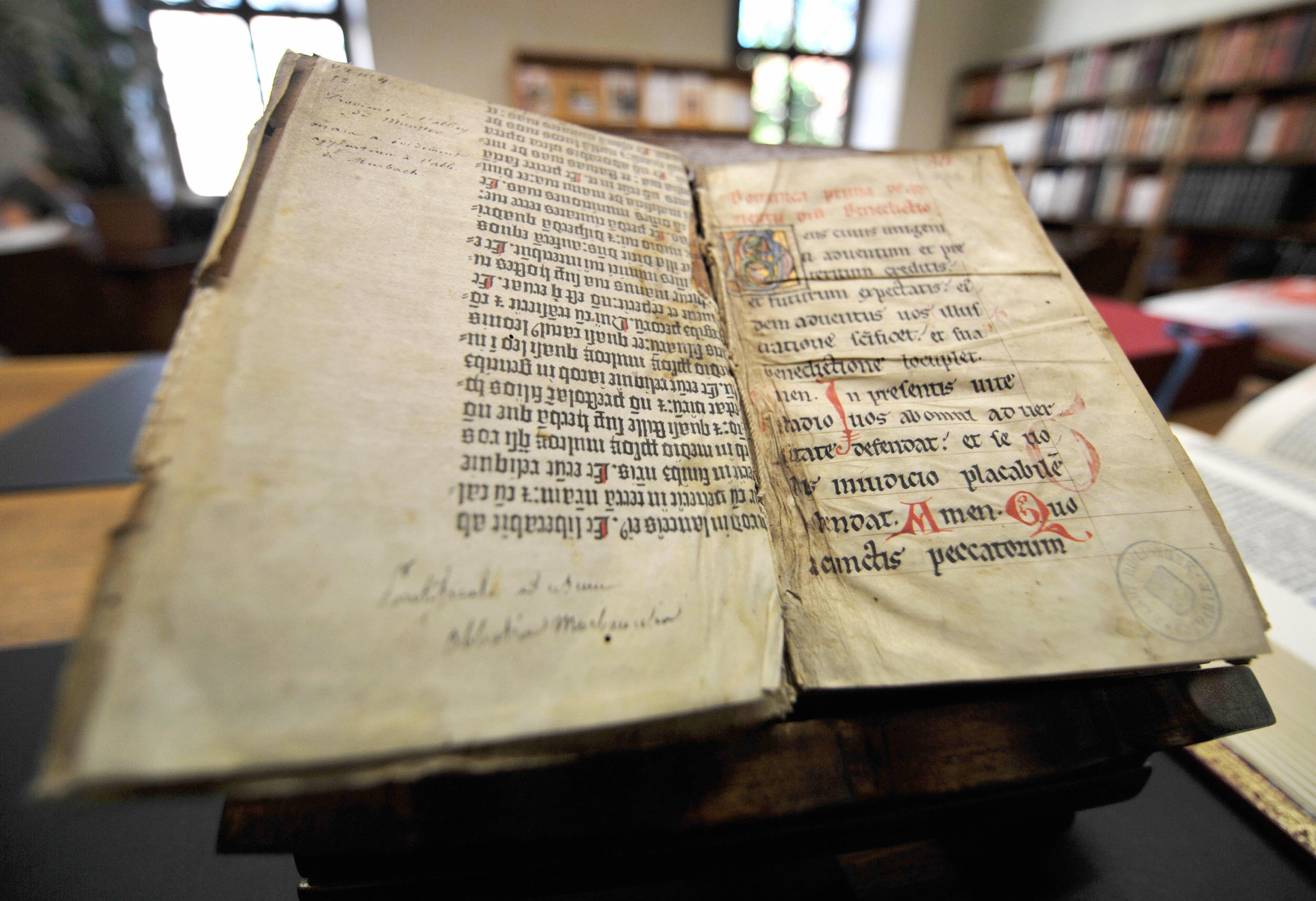 A picture taken on May 29, 2009 in Colmar, northeastern France, shows pages of the Gutenberg Bible discovered in a library by a library assistant, (Johanna Leguerre—AFP/Getty Images)