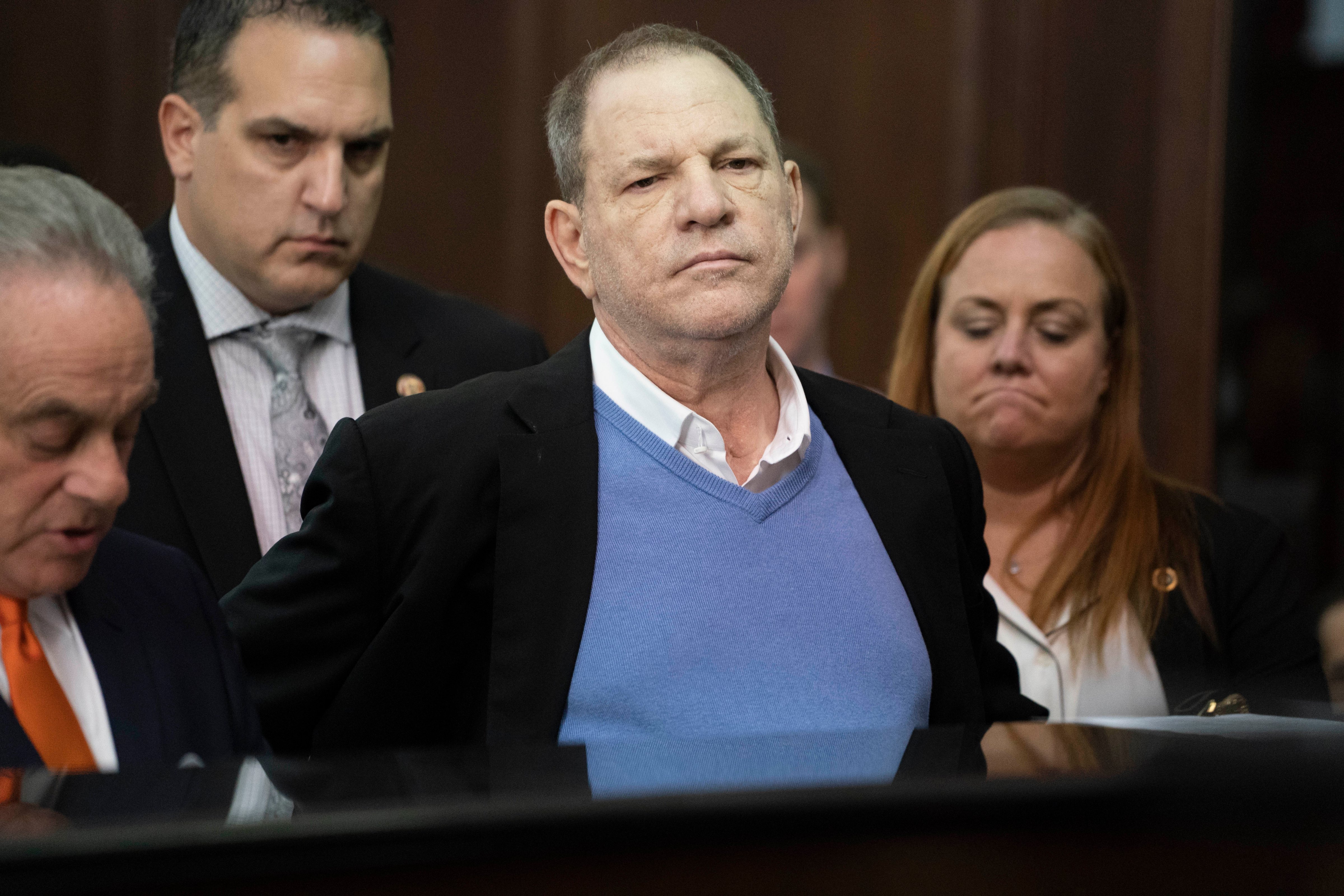 Harvey Weinstein along with his attorney Benjamin Brafman (L) appears at his arraignment in Manhattan Criminal Court on Friday, May 25, 2018. (Steven Hirsch—Pool/ Getty Images)