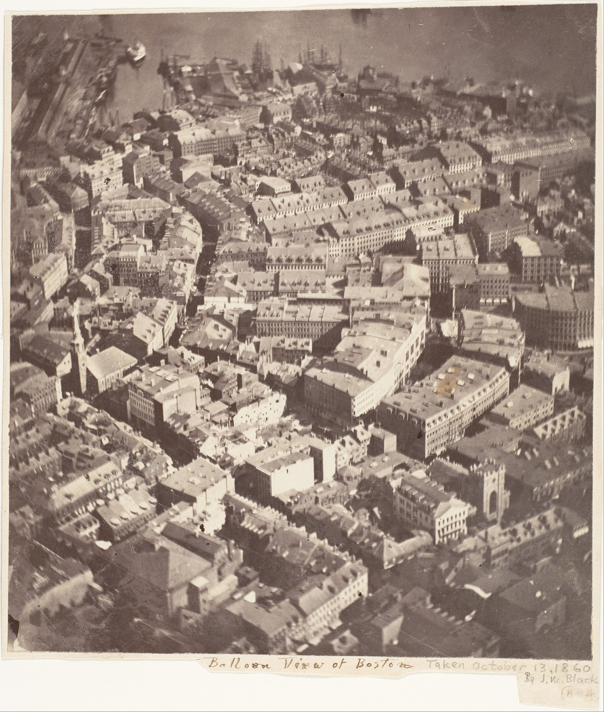 James Wallace Black's aerial photograph taken from tethered hot air balloon Queen of the Air 2,000 feet above Boston on October 13, 1860. It is the oldest surviving aerial photograph and first made in America (James Wallace Black—Metropolitan Museum of Art)