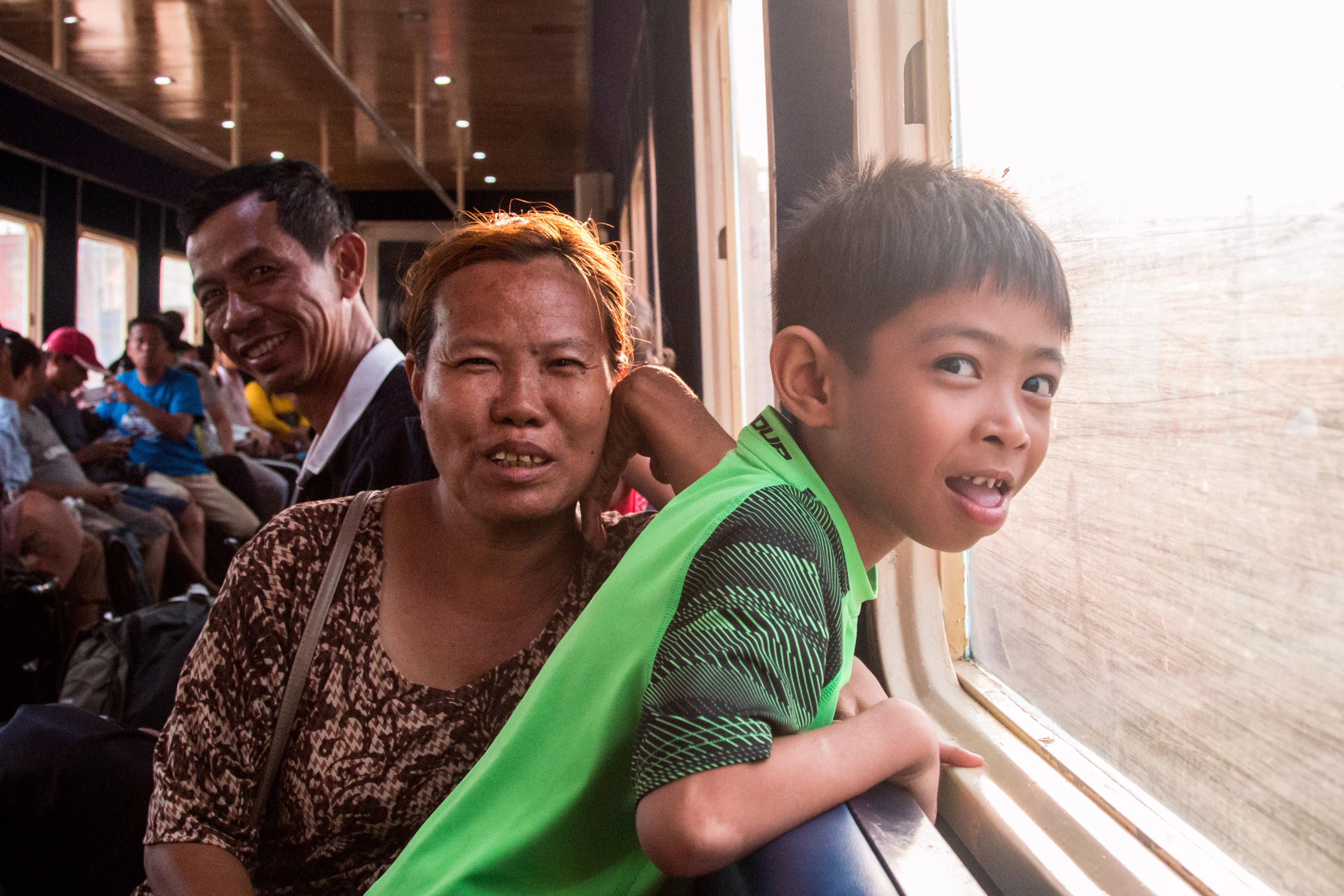 The thrill of the ride. Passengers seeking respite from the heat ride Phnom Penh's new airport shuttle train. (Eli Meixler—Time)