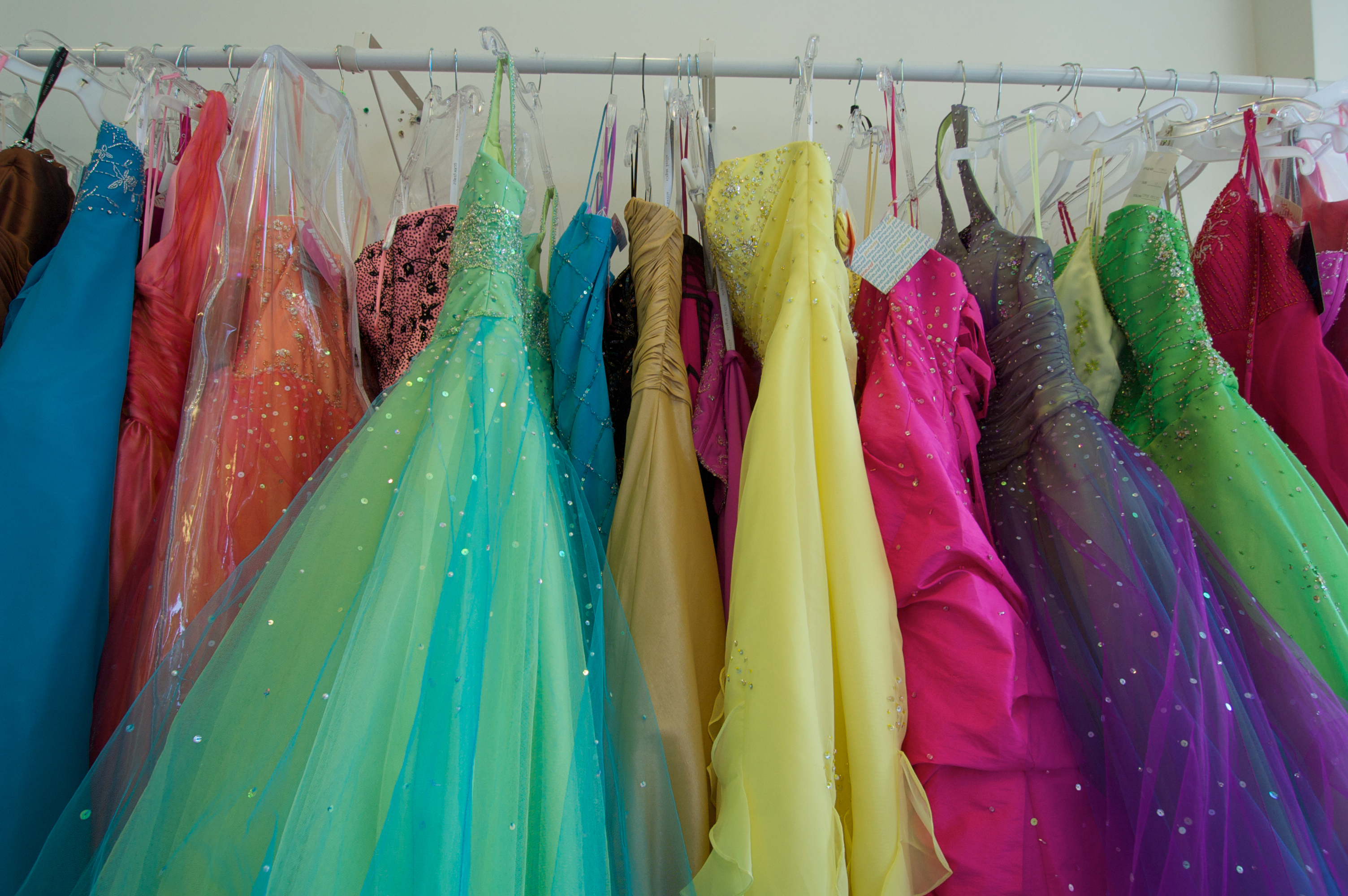 Pretty prom dresses ready for young shoppers crowd the rack. (Alan Fishleder—Getty Images)
