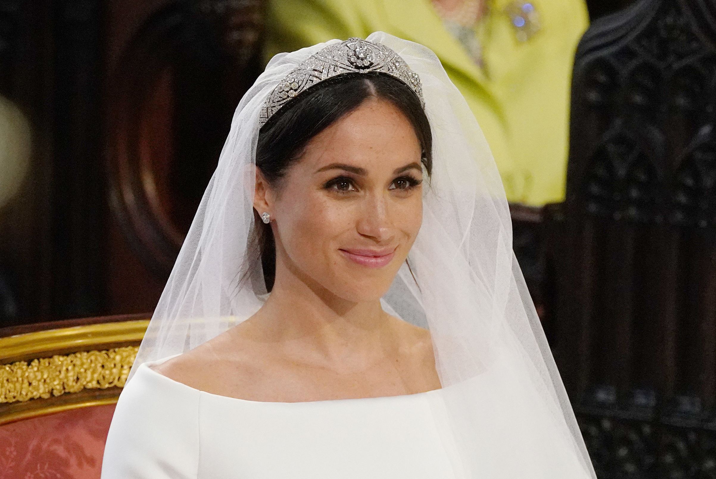 Meghan Markle wears the Queen Mary's diamond brooch tiara in St George's Chapel, Windsor Castle, May 19, 2018. (Jonathan Brady—PA Wire)