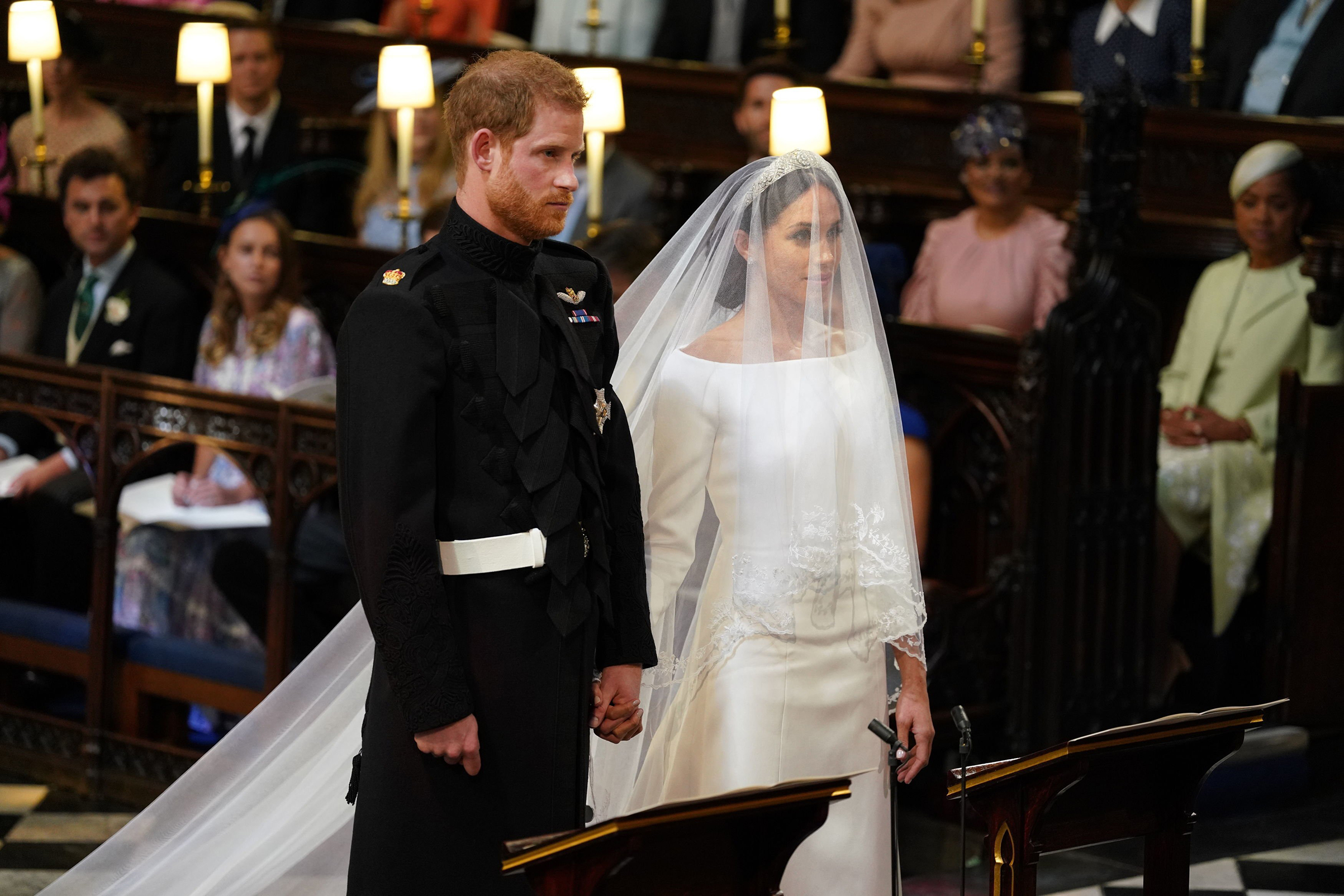 Prince Harry and Meghan Markle in St George's Chapel at Windsor Castle for their wedding, May 19, 2018. (Dominic Lipinski—PA Wire)