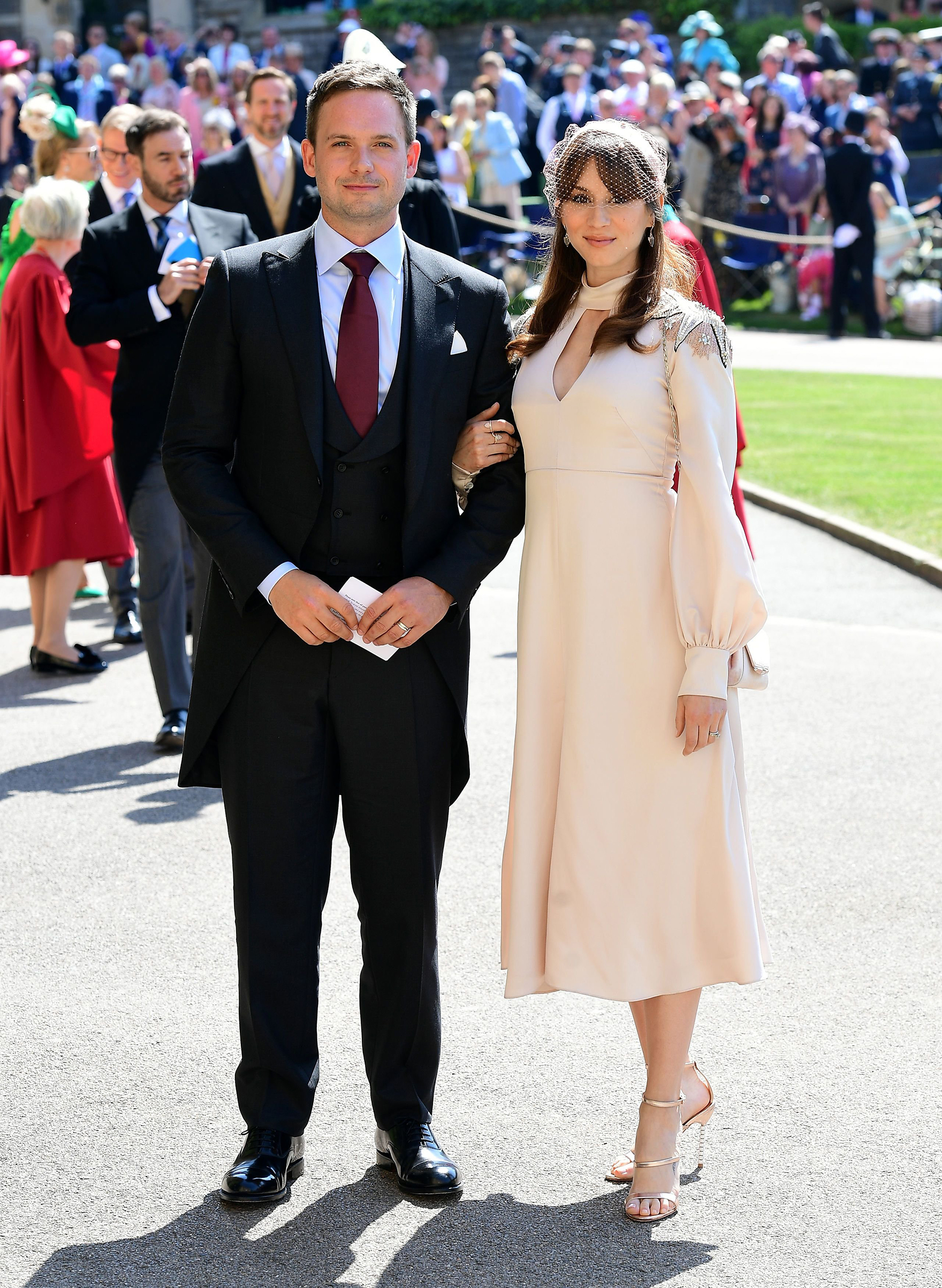 Patrick J. Adams and Troian Bellisario arrive for the wedding ceremony of Prince Harry, Duke of Sussex and Meghan Markle at St George's Chapel, Windsor Castle, in Windsor, on May 19, 2018.