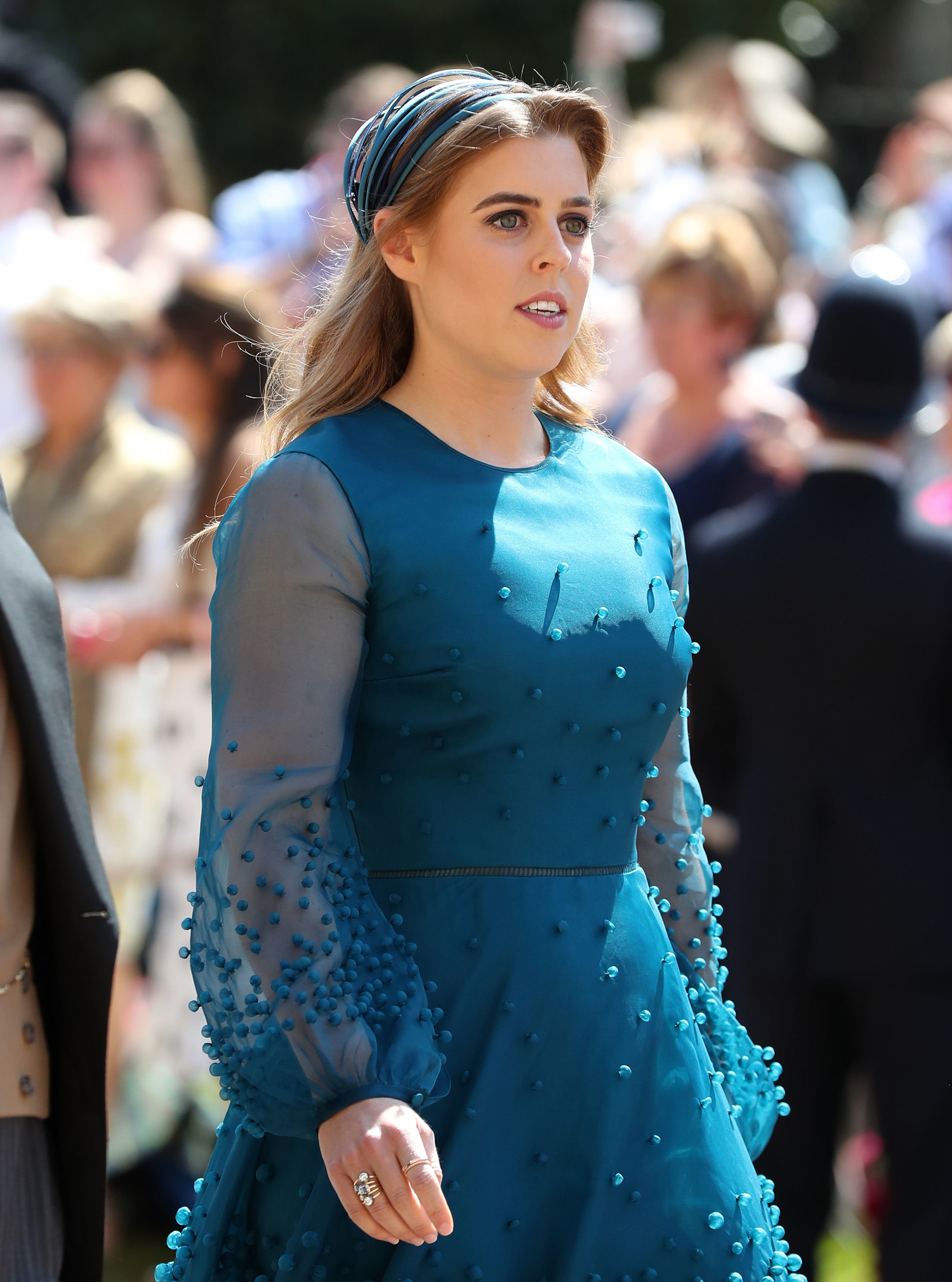 Princess Beatrice arrives at St George's Chapel at Windsor Castle before the wedding of Prince Harry to Meghan Markle on May 19, 2018.