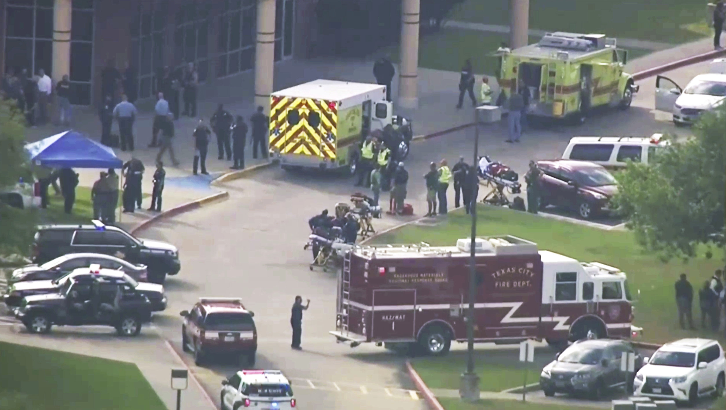 Police officers respond to a high school in Santa Fe, after an active shooter was reported on campus on May 18, 2018 (KTRK-TV ABC13/AP)