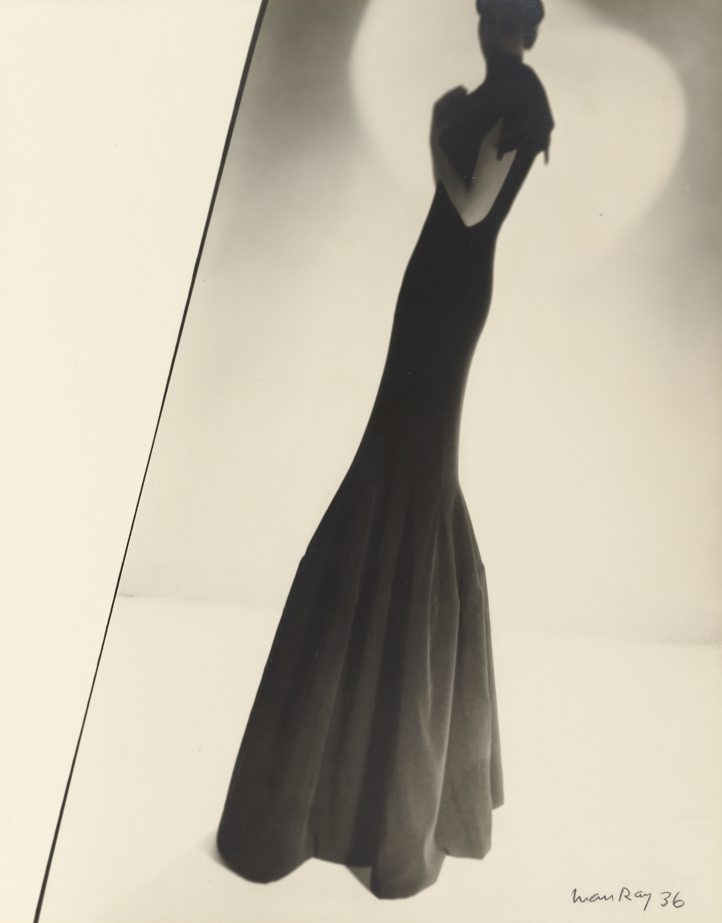 Model Wearing a Gown by Augustabernard, 1936 (Man Ray—Man Ray Trust ARS-ADAGP/J. Paul Getty Museum)