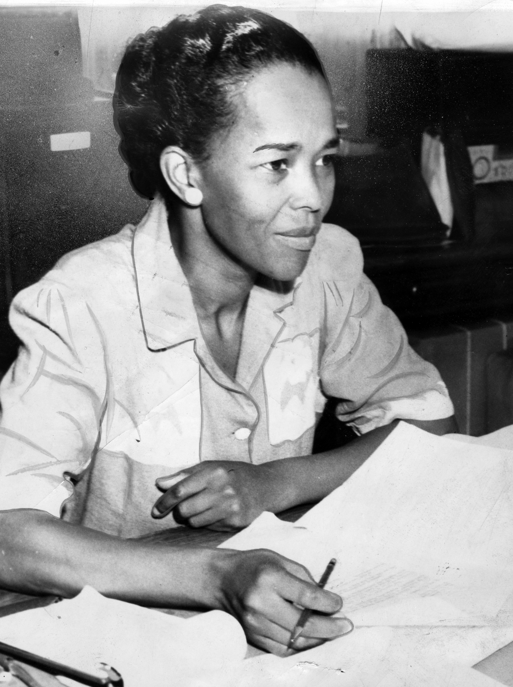 A photograph of Ella Baker as NAACP Hatfield representative, behind a desk with paperwork, Sept. 18, 1941. (Afro Newspaper/Gado/Getty Images)