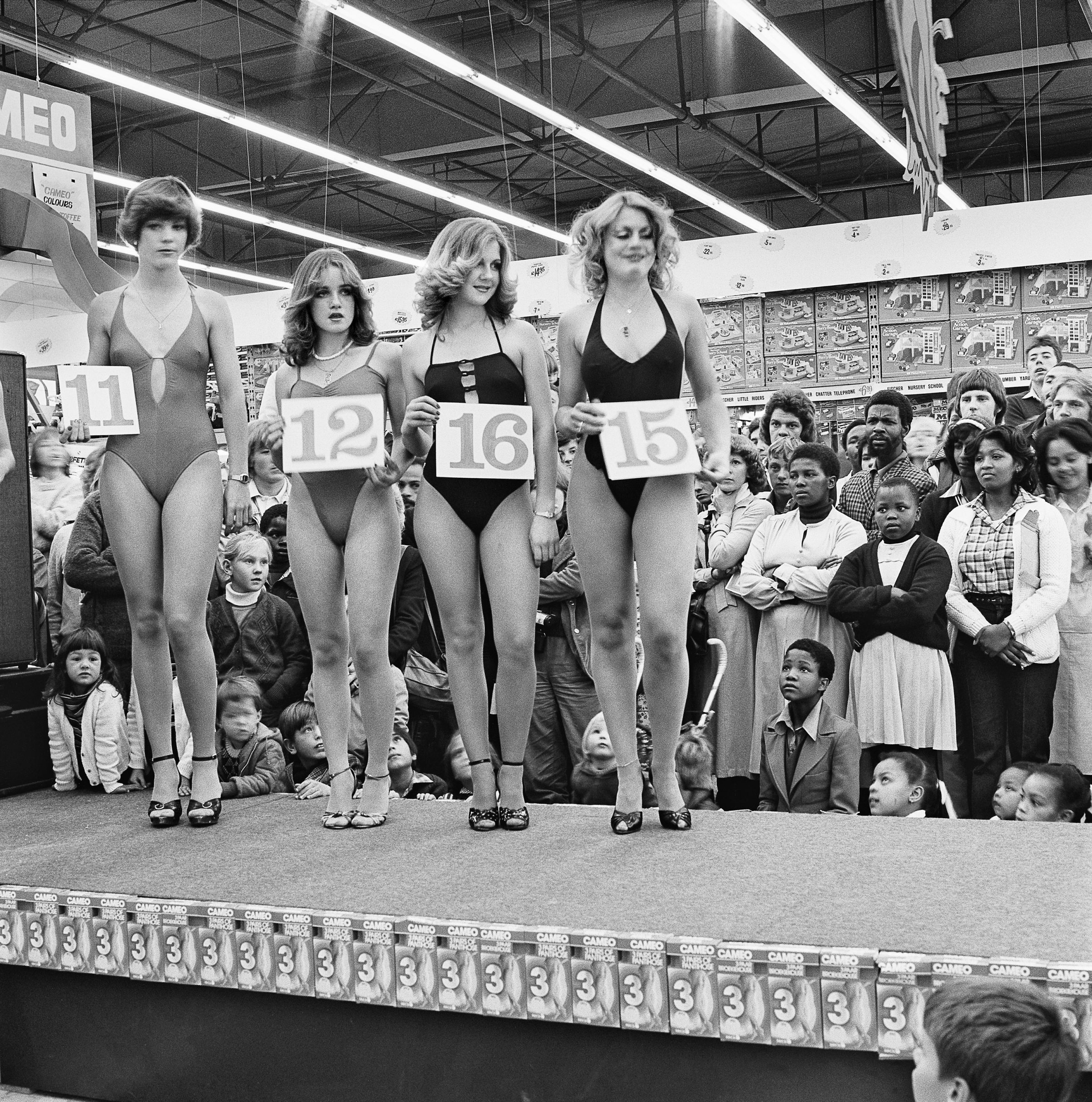 Saturday morning at the Hypermarket: Semi-final of the Miss Lovely Legs Competition. 28 June 1980 (David Goldblatt—Courtesy of the Goodman Gallery)
