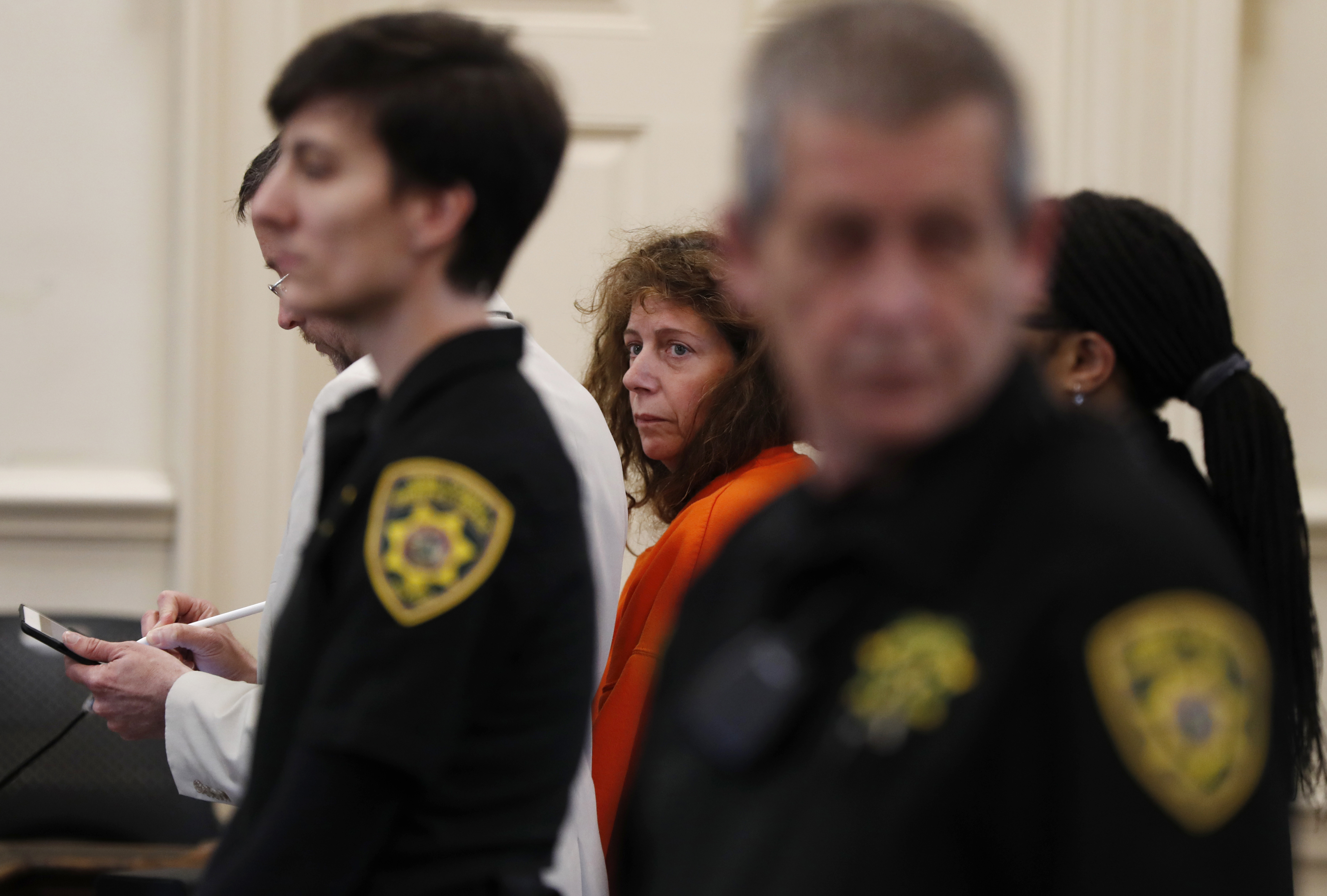 Carol Sharrow, of Sanford, Maine, stands for her arraignment on manslaughter charges at the York County Superior Court in Alfred, Maine on June 4, 2018. (Robert F. Bukaty—AP)