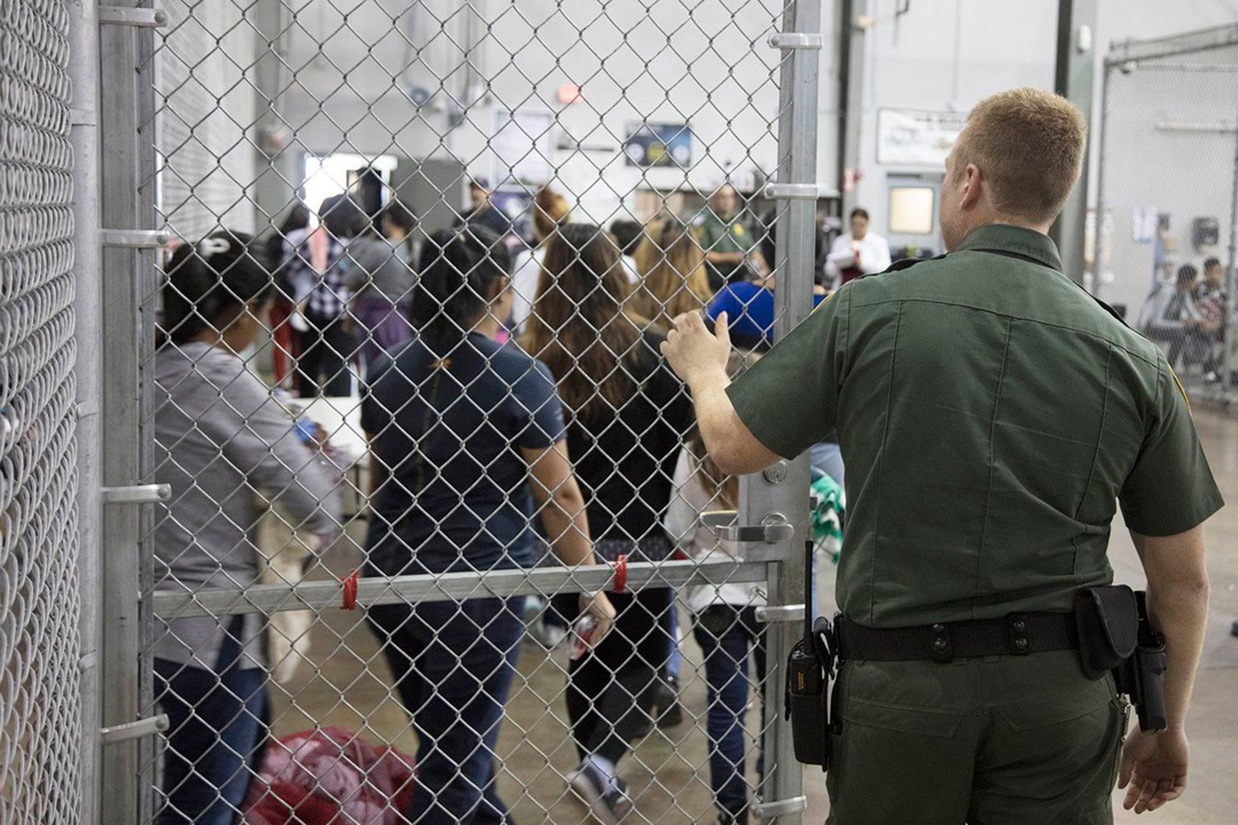 An undated handout photo made available on 18 June 2018 by the US Customs and Border Patrol showing people inside a United States Border Patrol Processing Center, in McAllen, Texas (US CUSTOMS AND BORDER PATROL/HANDOUT/EPA-EFE/REX/Shutterstock)