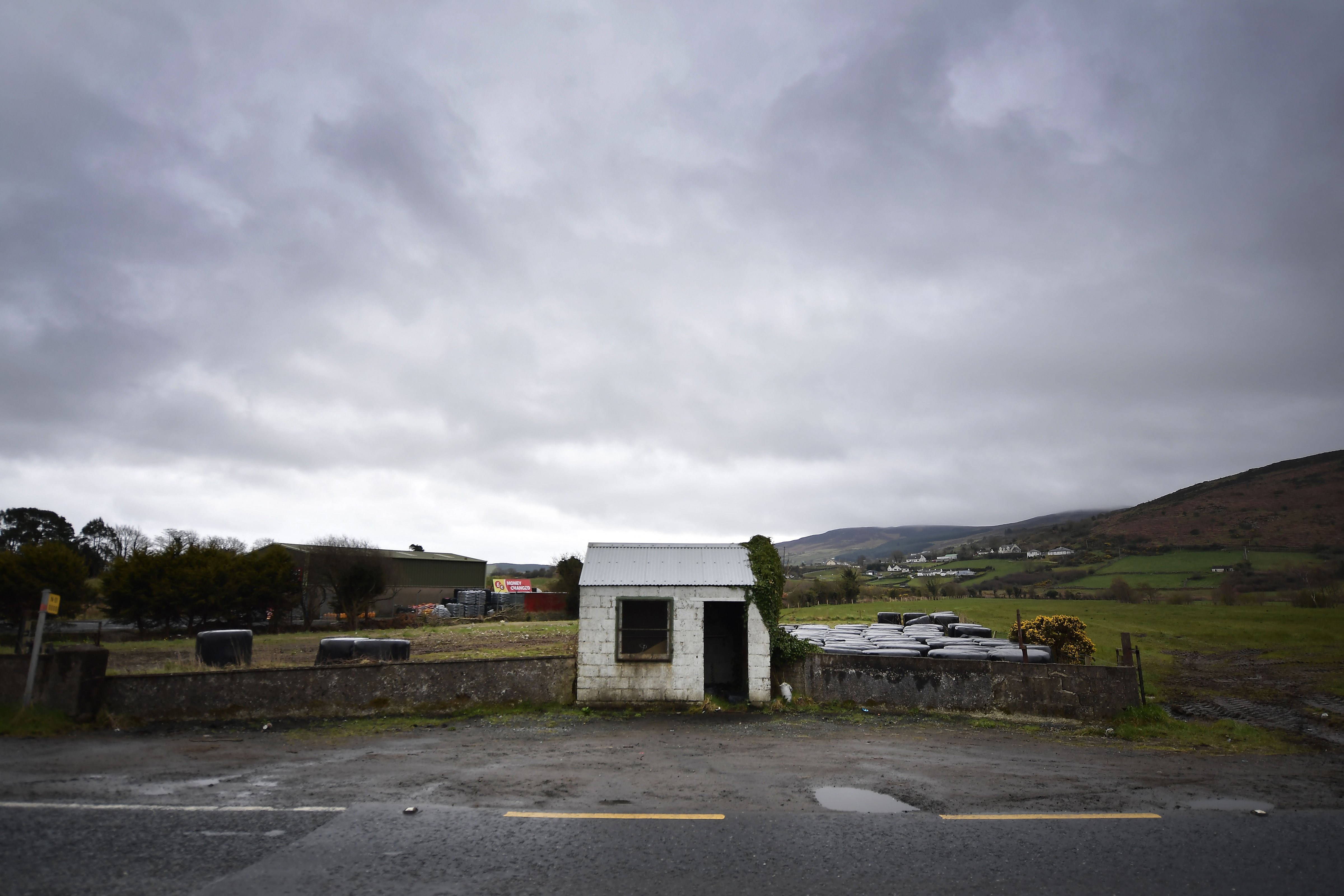 A former customs guard hut directly situated on the north-south Irish border stands disused as Brexit is triggered on March 29, 2017 in Newry, Northern Ireland. The northern Irish border is the United Kingdom's only land border with the rest of Europe. (Charles McQuillan—Getty Images)