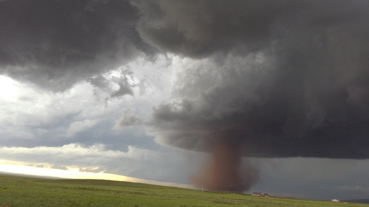 Aaron Voos shared images of a tornado touching down on the plains outside Laramie, Wyoming on Wednesday (Courtesy Aaron Voos)