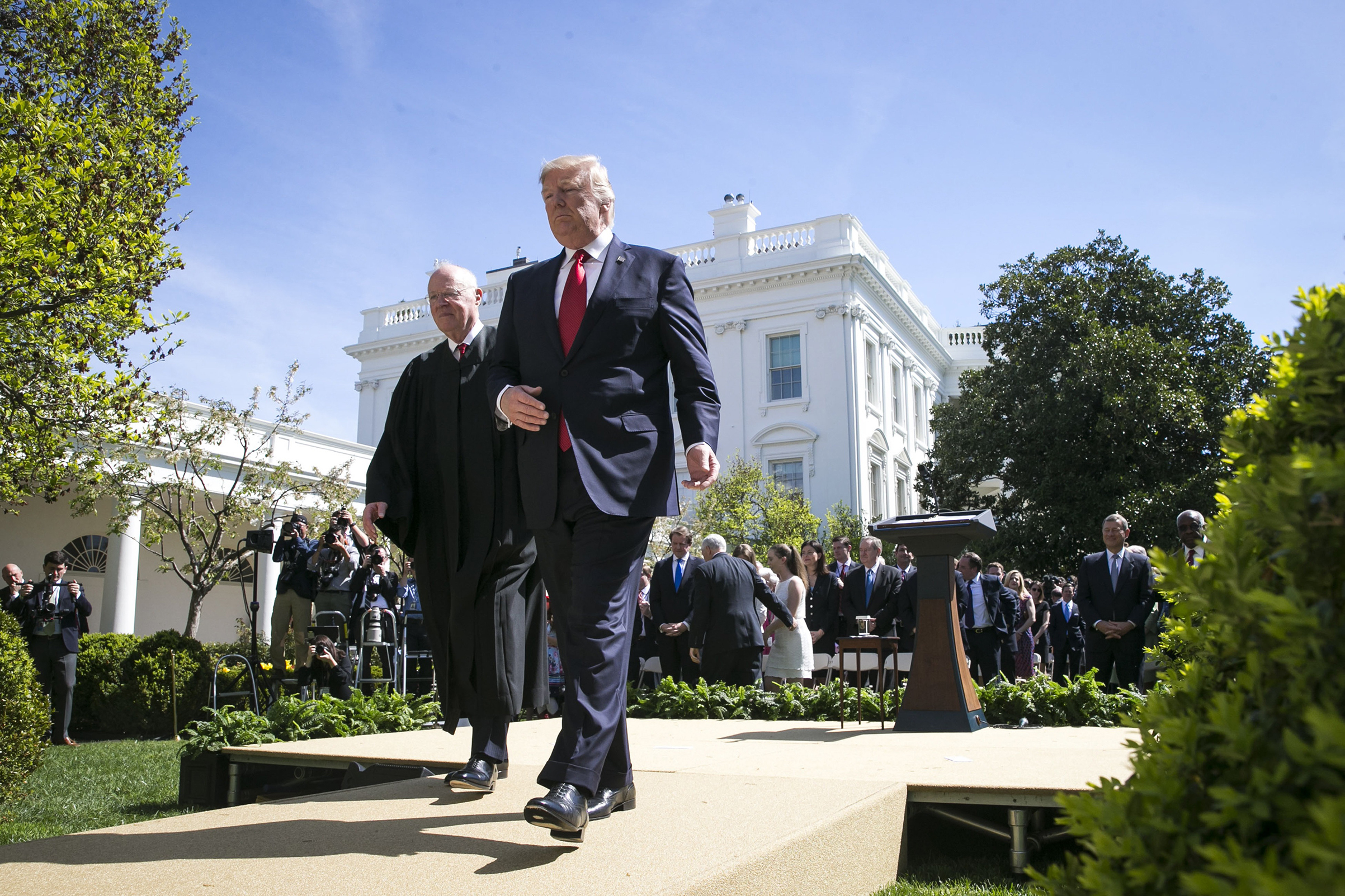 Anthony Kennedy leaves the Rose Garden with President Donald Trump April 10, 2017, after swearing in Neil Gorsuch as the 113th Supreme Court Justice. (Al Drago—The New York Times/Redux)