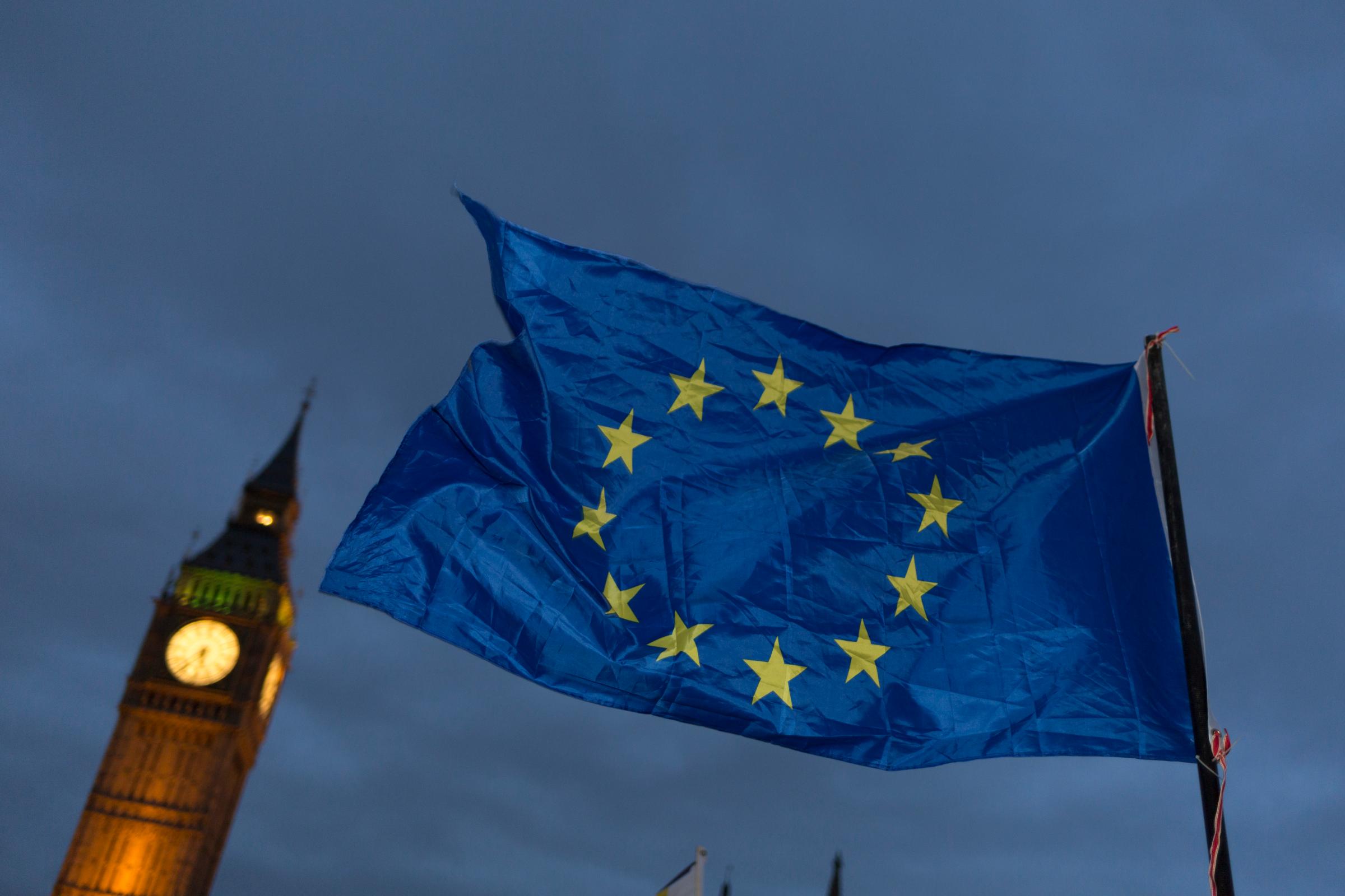 EU Flag And British Parliament