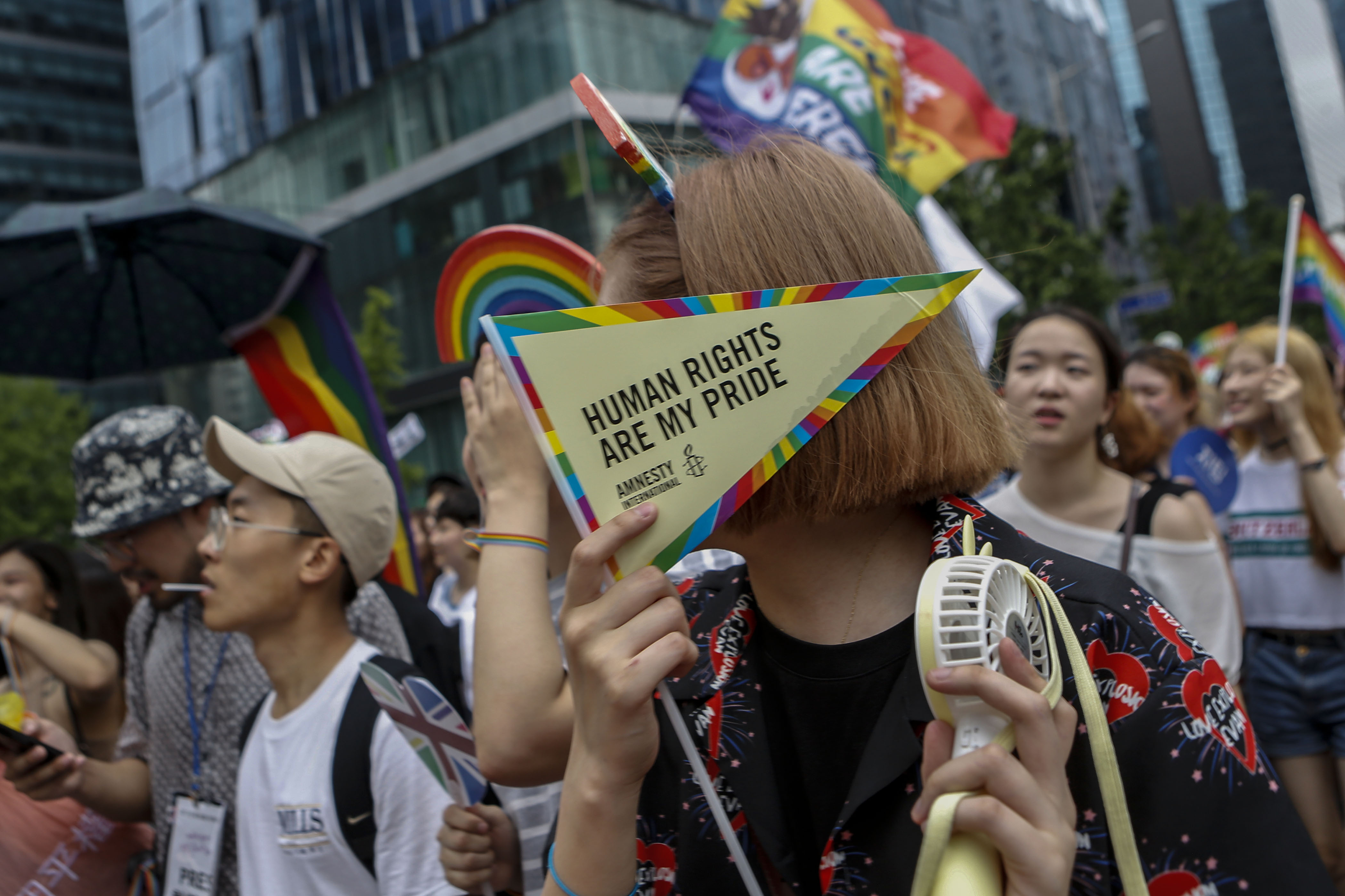 LGBT Group members in a marching parade during an LGBT rally near square in Seoul, South Korea, on 16 July 2017. (Seung-il Ryu—NurPhoto via Getty Images)