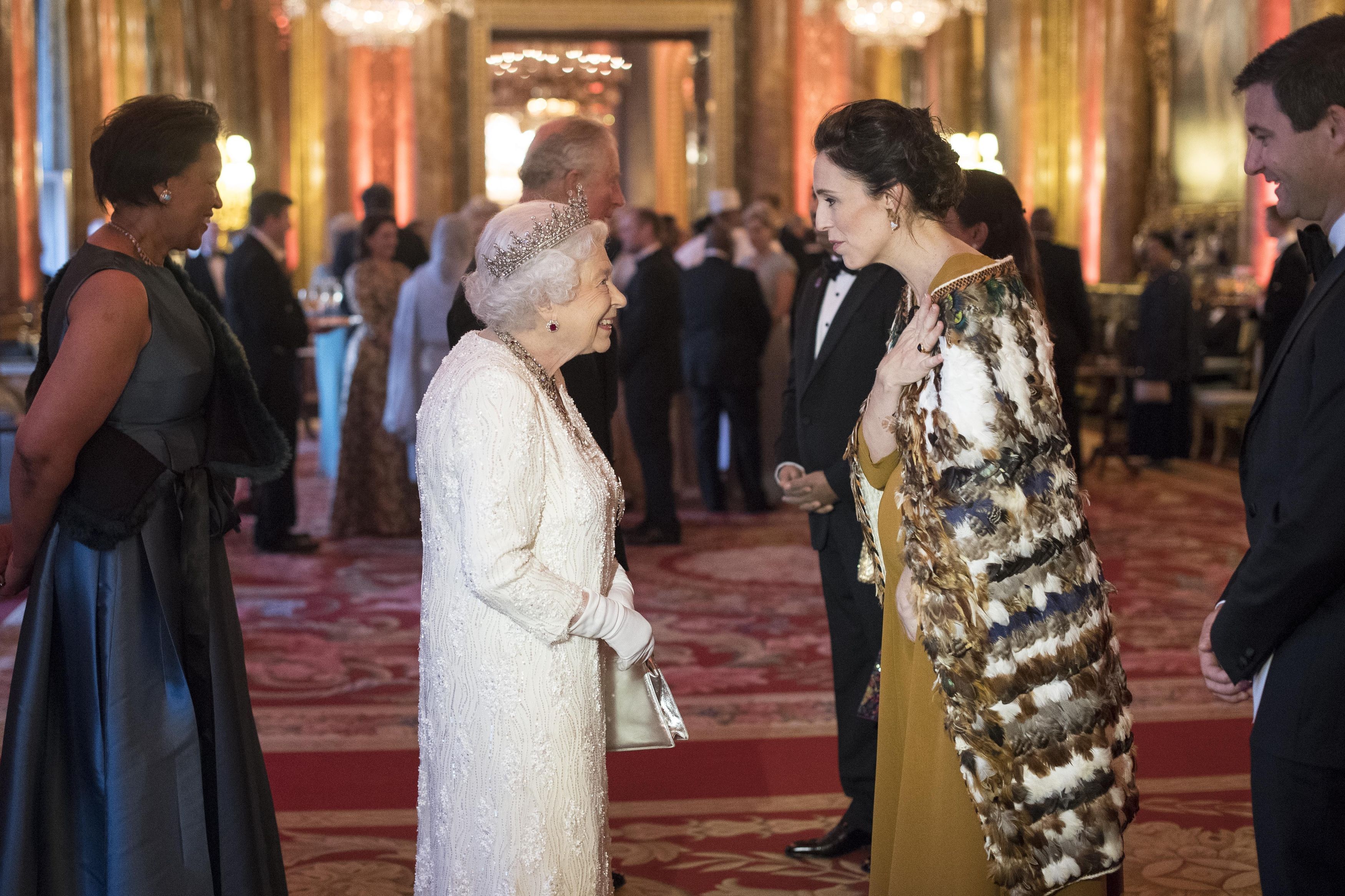 Queen Elizabeth II greets Jacinda Ardern, Prime Minister of New Zealand at during the Commonwealth Heads of Government Meeting at Buckingham Palace on April 19, 2018 in London, England. (Victoria Jones—WPA Pool/Getty Images)
